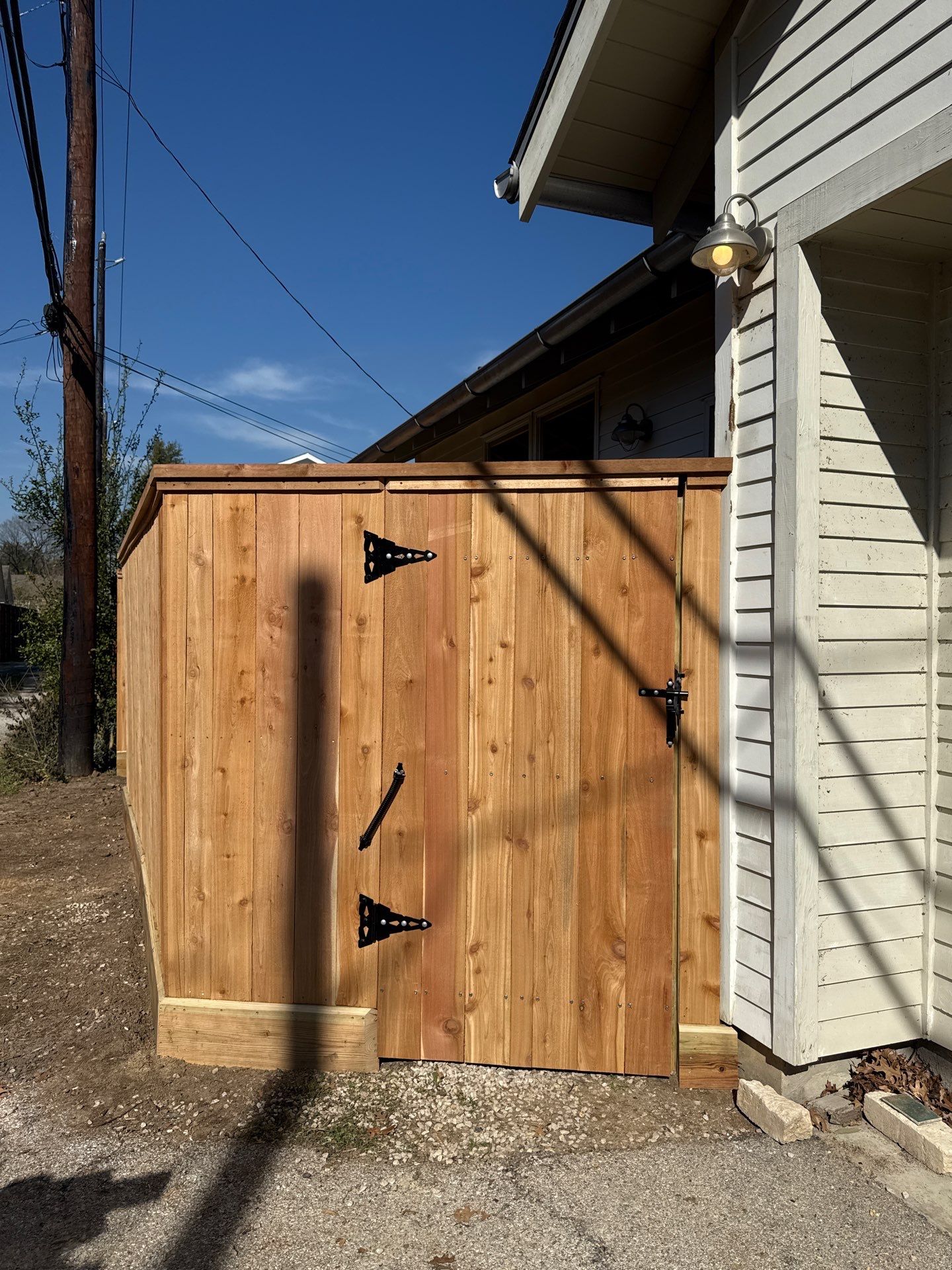 Durable Fence & Gate Installation with Premium Stain by Tim's Fences