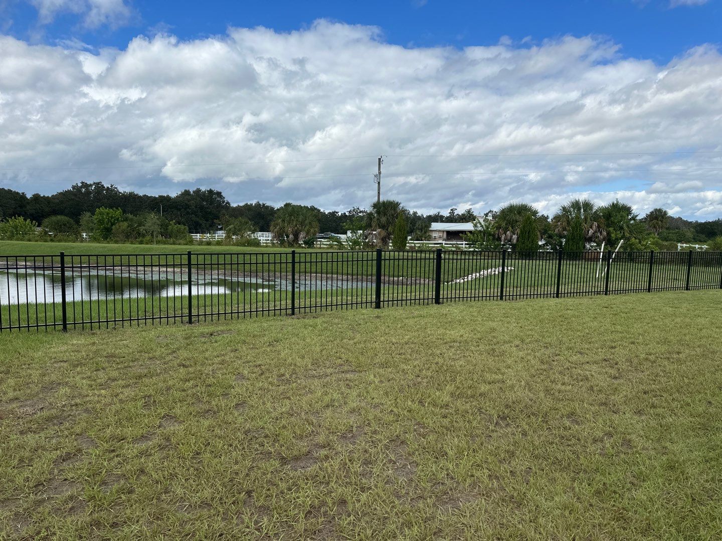 Aluminum Fence Installation using Black 3 Rail Aluminum Fence by Asap fence and gates, LLC