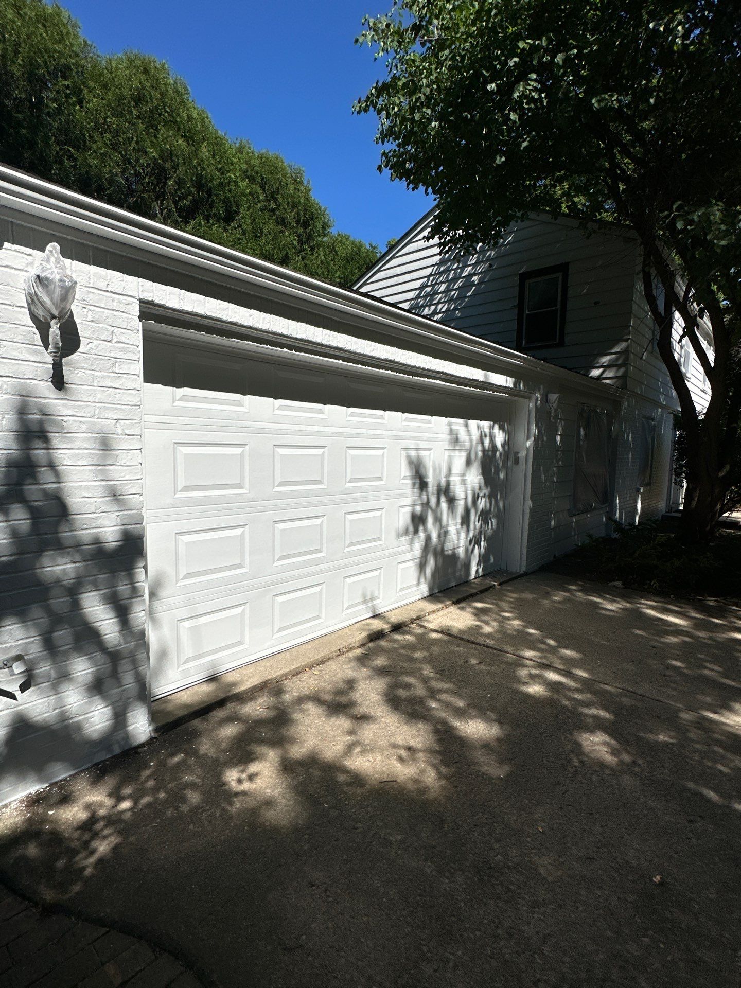 Shorewood Exterior Painting and Siding Refresh With Contrast Trim by OCS Contracting Services