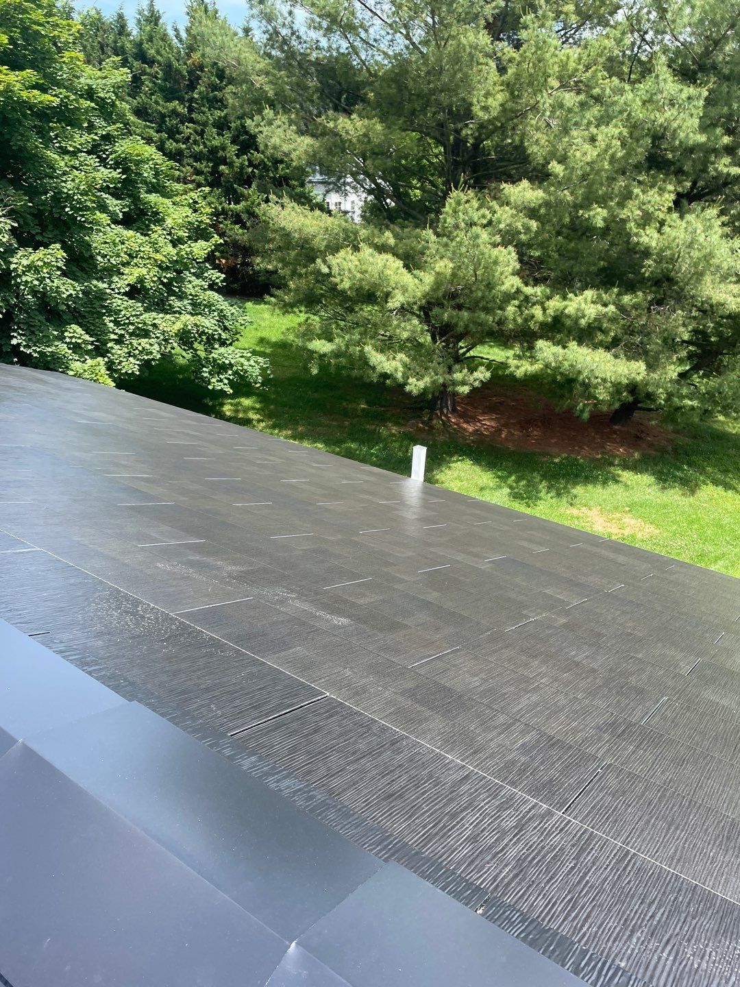 Tesla Solar Roof Installation by American Home Contractors