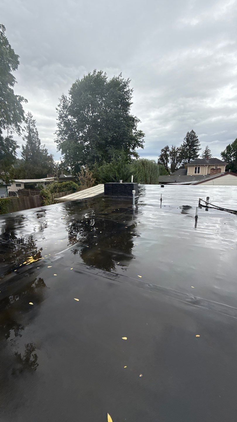 Residential Membrane Roof Replacement by Orezona Building & Roofing Company, Inc.