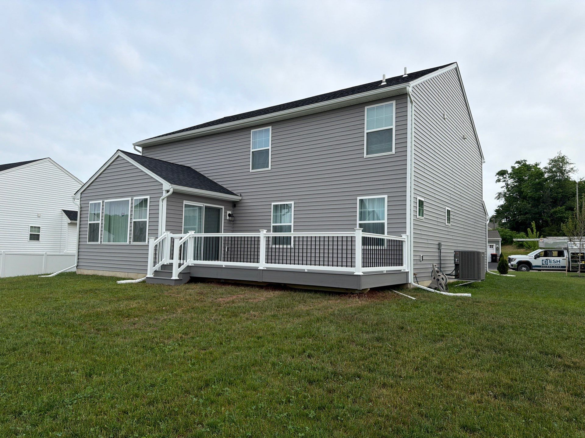 Custom Gray Composite Deck Installation in Duncannon by Esh Builders