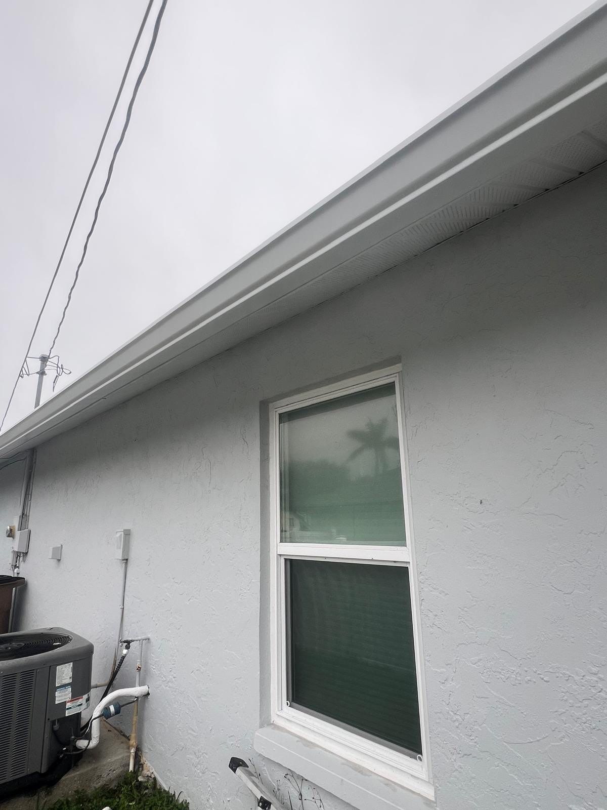 Seamless Gutter Installation Before Rainy Season in Cape Coral FL by Gutter Professors