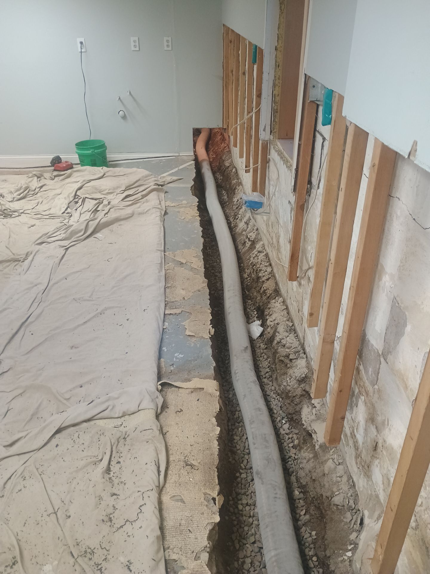 Interior Drain Tile Installation in South Minneapolis by Waterproofing Northeast