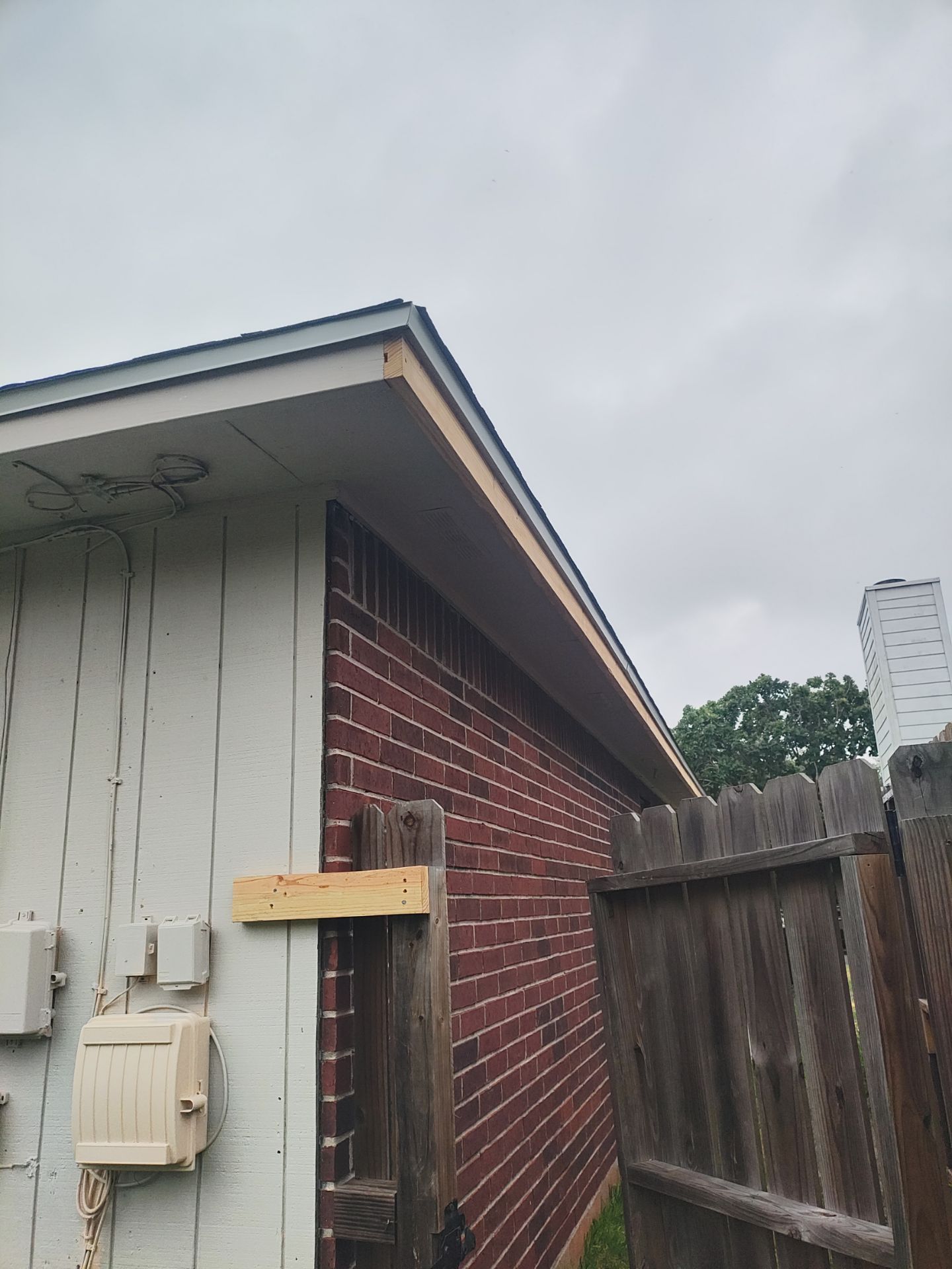 Nothing looks nicer than a little black roof by Bayfront Roofing and Construction