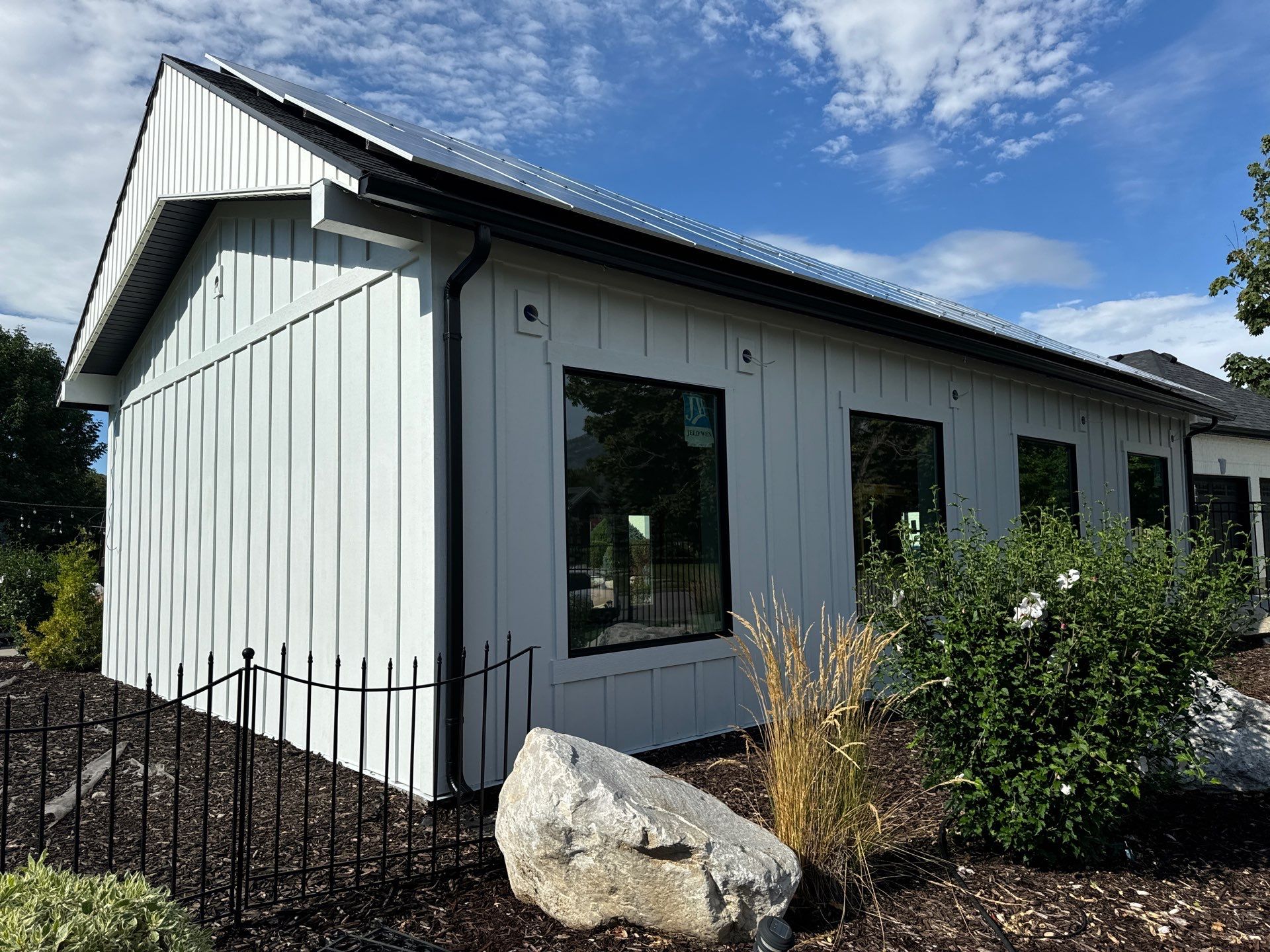 Highland | Modern Farmhouse Board & Batten | Arctic White & Black by Ideal Siding Utah