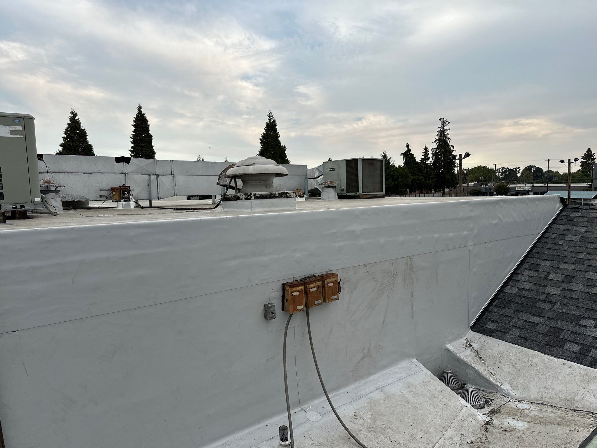 Summit Grey Lum Yun Salem Oregon Commercial Roof by Orezona Building & Roofing Company, Inc.