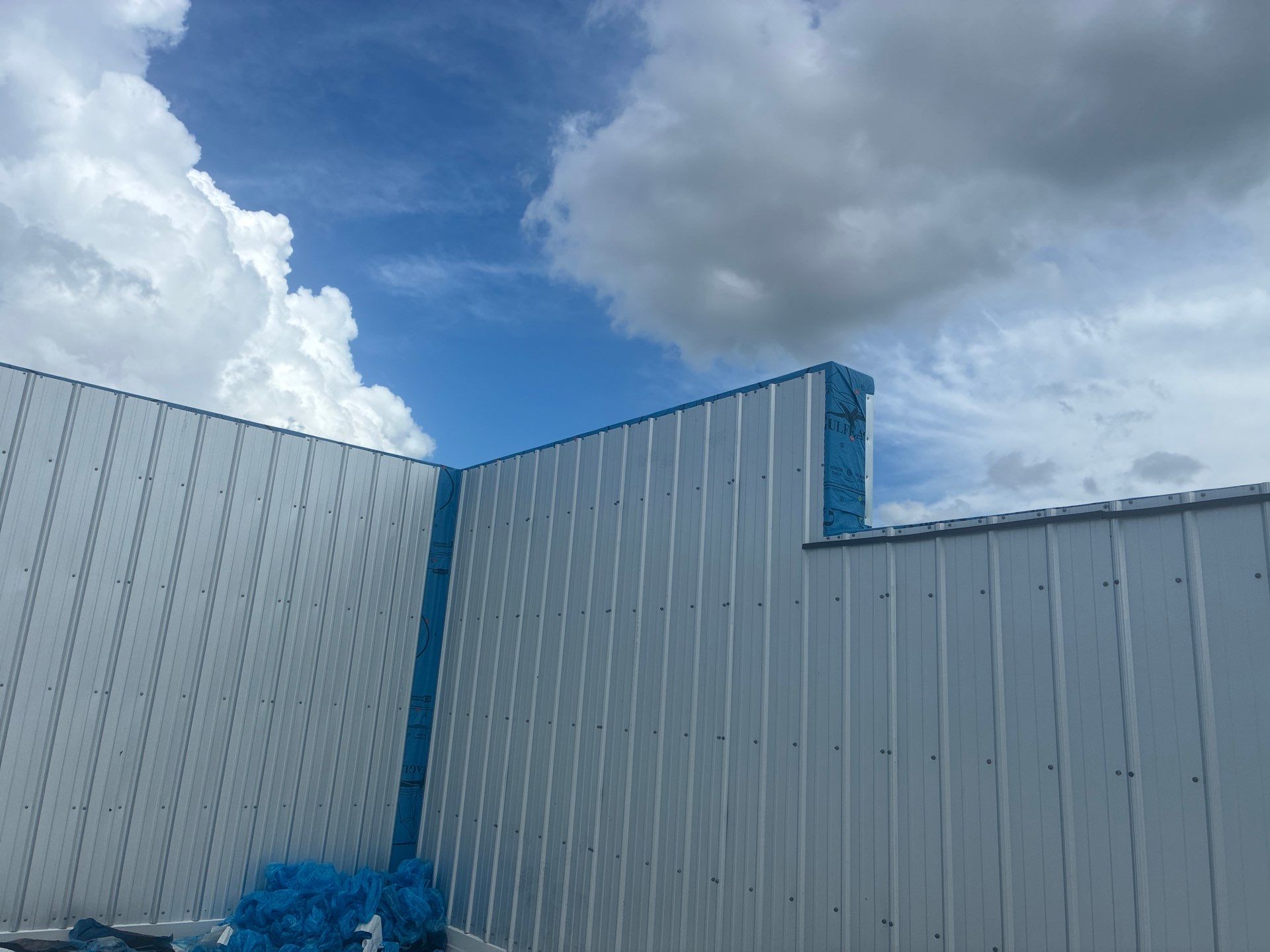 Orlando Commercial Roof Installation and Metal Parapet Wall Siding by Tip Top Roofing Co., Inc.