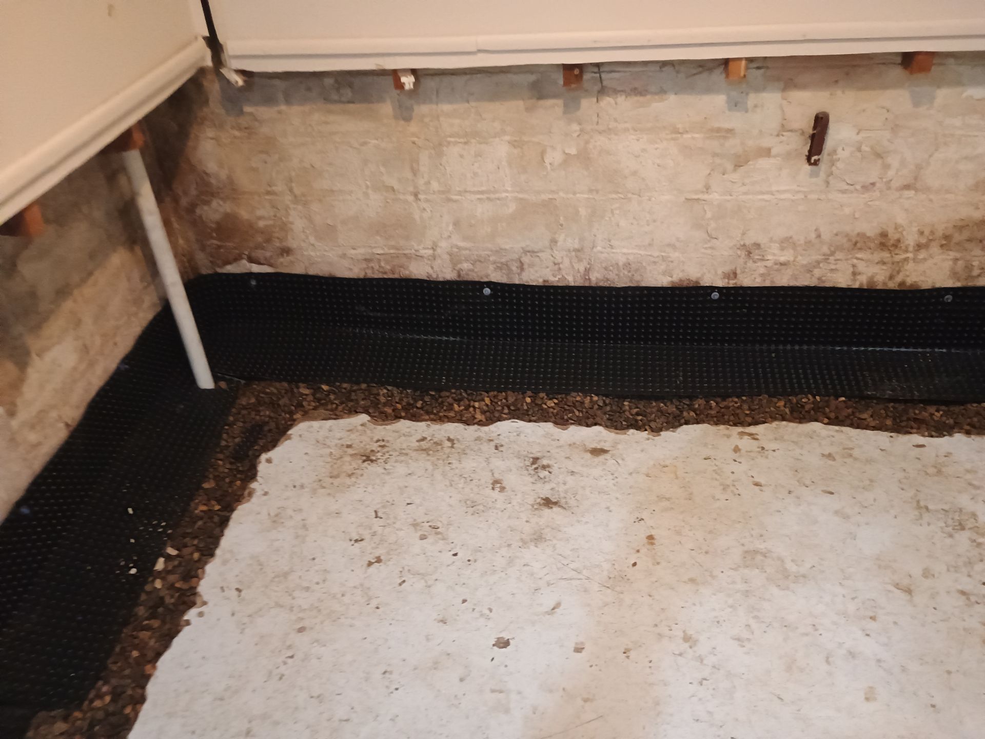 Interior Drain Tile & Sump Pump Installation in St. Paul, MN by Waterproofing Northeast