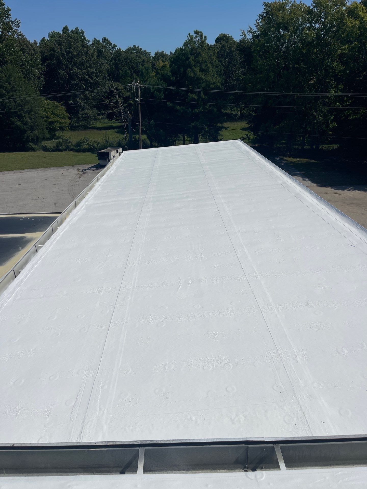 Commercial Roofing Installation using Coatings by Kentucky Commercial Roofing