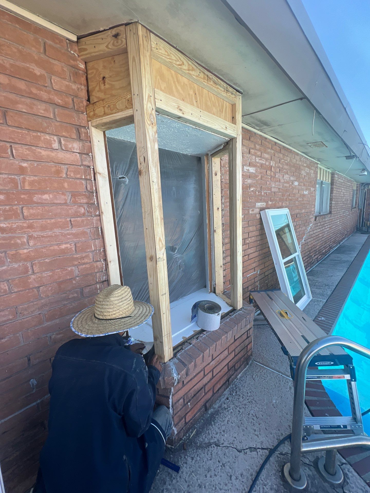 Windows in Brick with a Bay Window by Bayfront Roofing and Construction