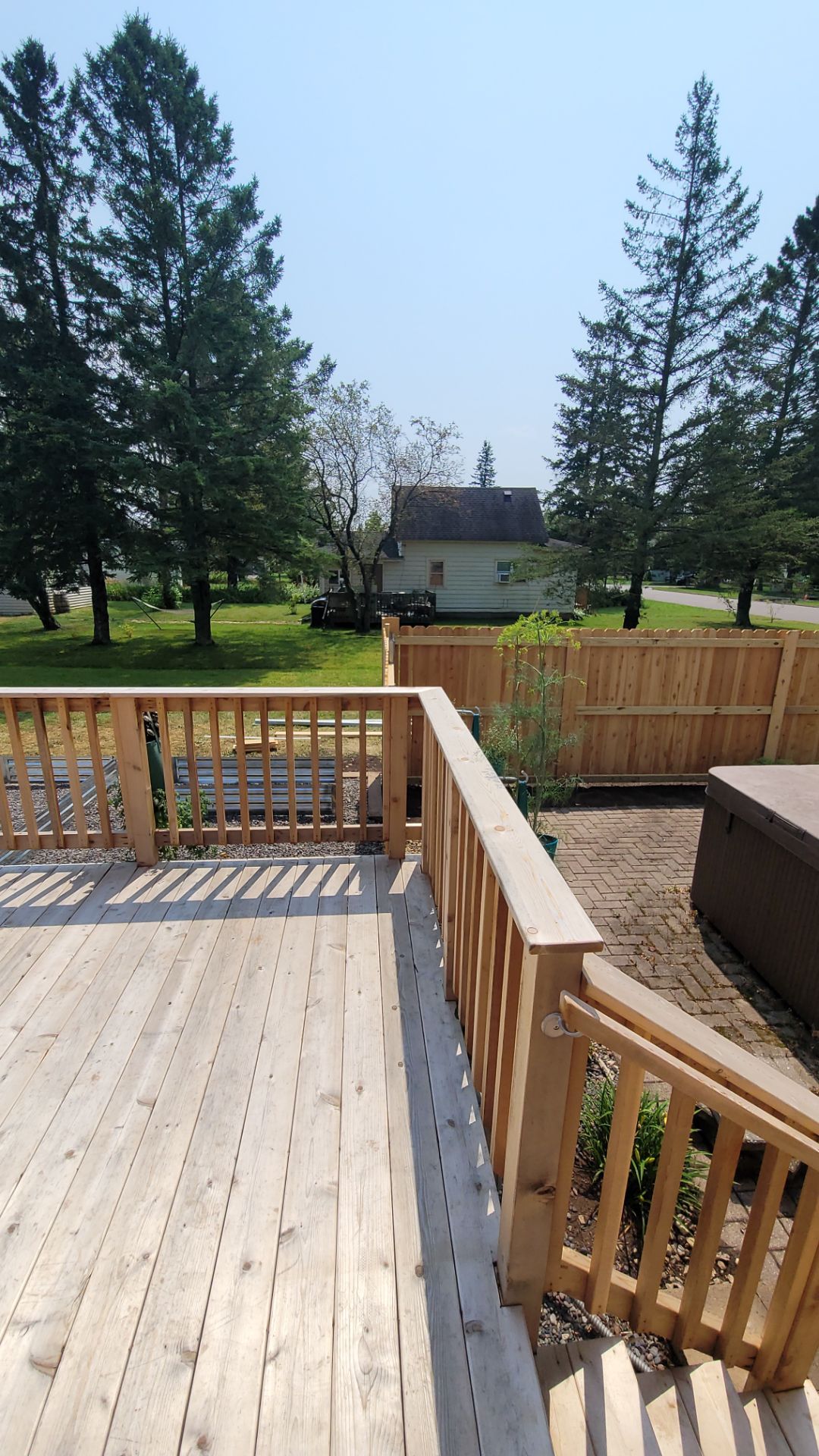 Multi-Level Cedar Deck by Anchor North Property Services