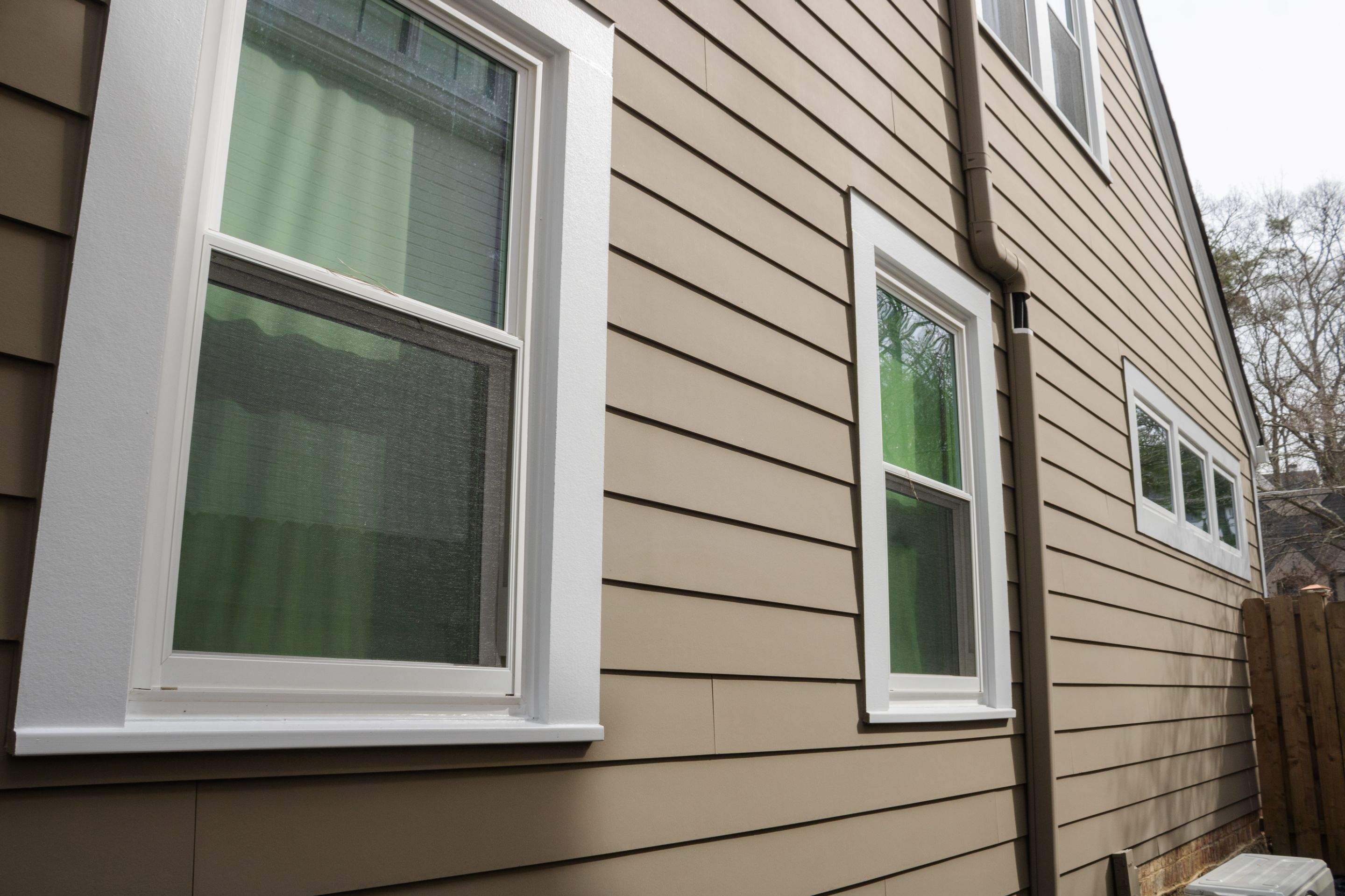 Full Siding Replacement, Deck Build, Exterior Paint, and Gutter Replacement  by Nelson Exteriors 