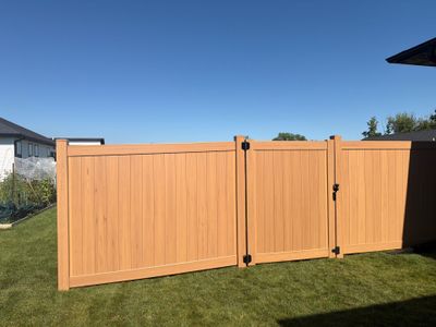 Residential Cypress Vinyl Privacy Fence Installation in Cedar Falls