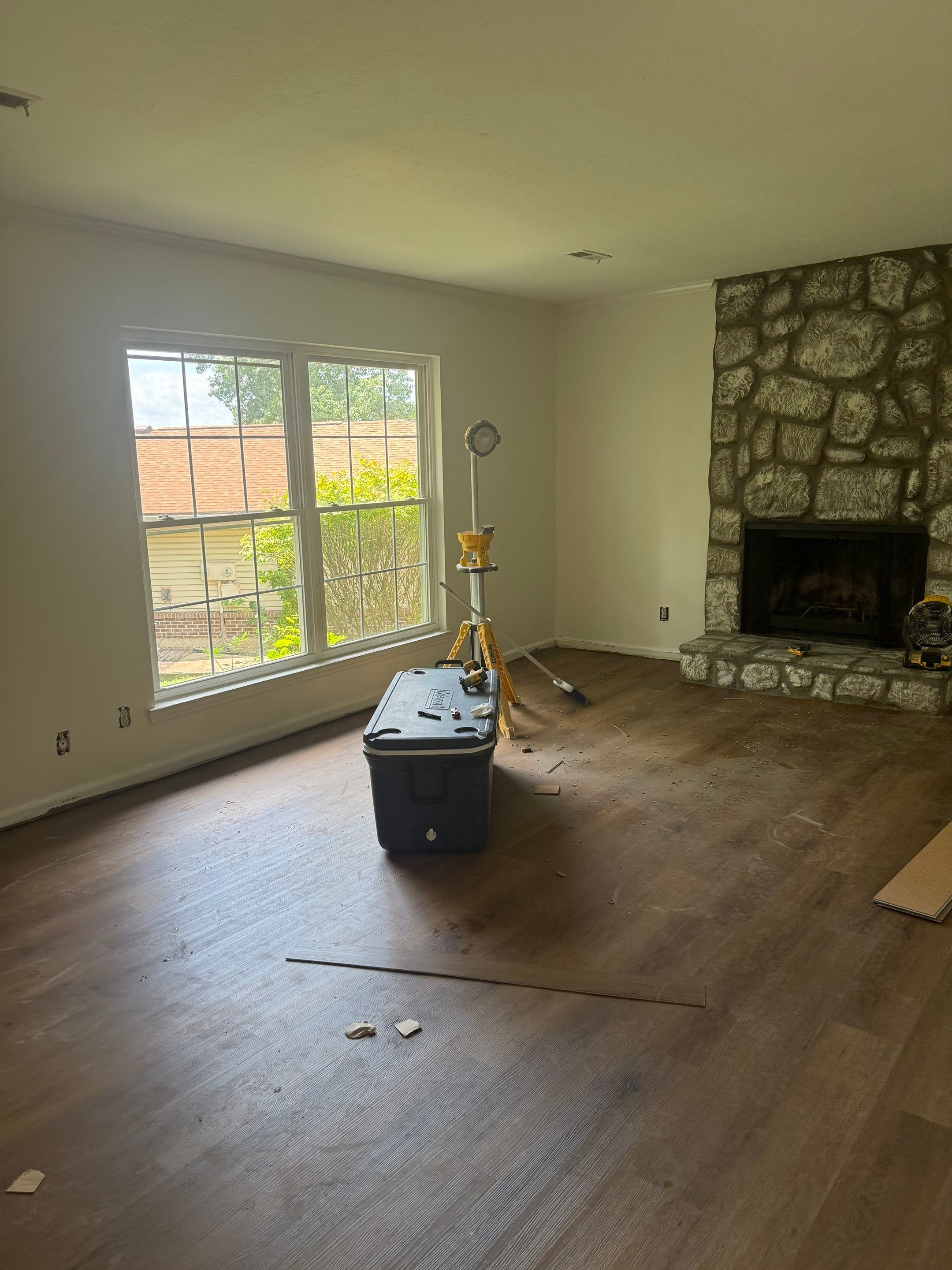 Complete Home Remodel Featuring Custom Kitchen and Wood-Look Plank Flooring by MAJO