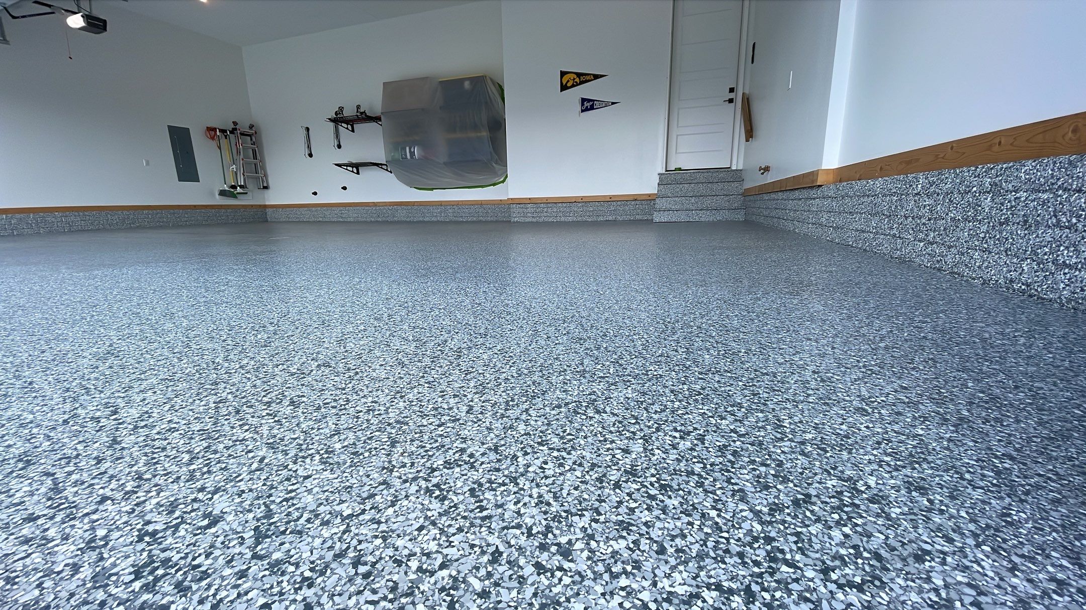 West Des Moines Garage REVAMP! by Revival Concrete Coatings, LLC