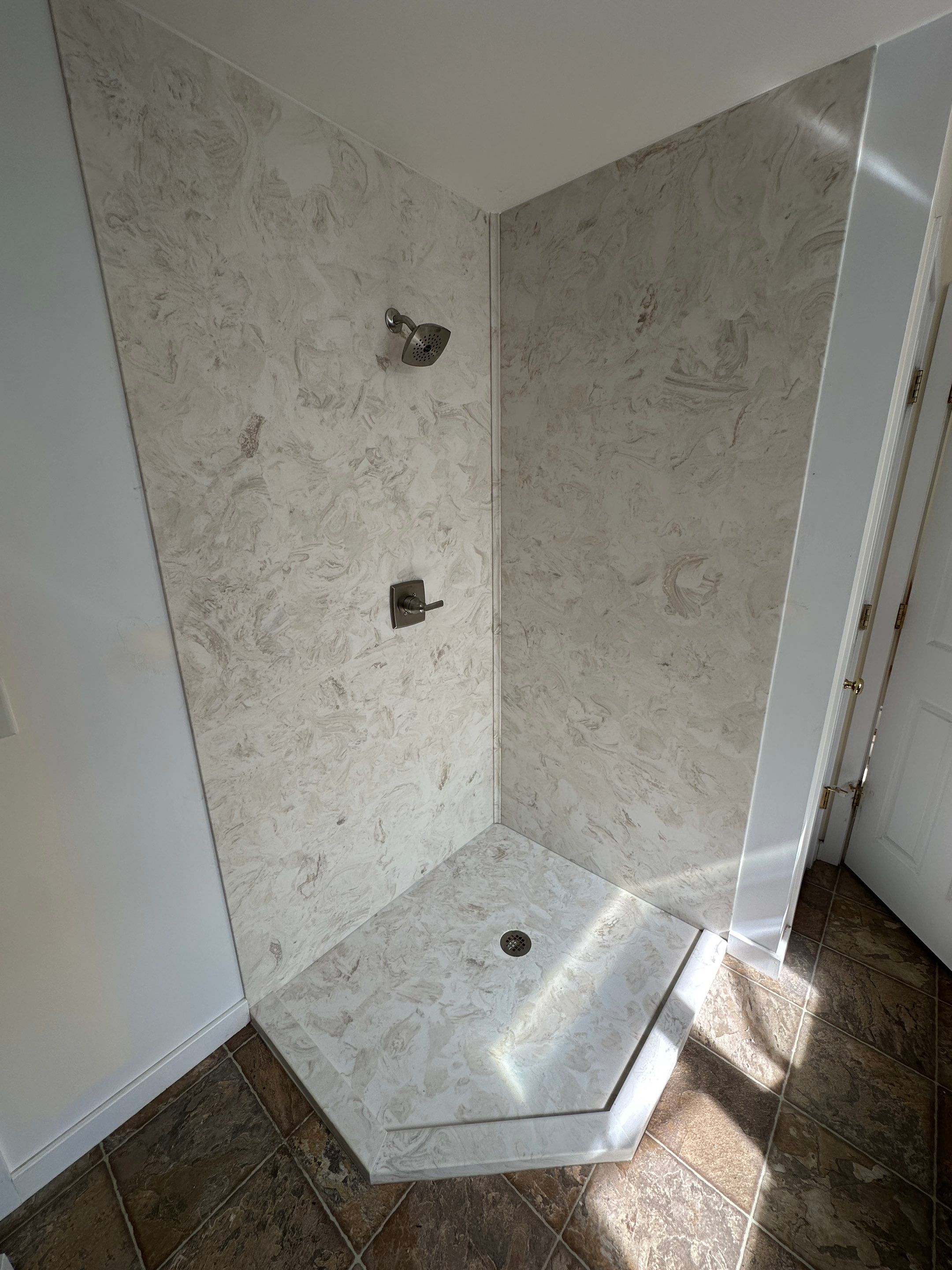 Solid Surface Neo Angle Shower by Renovatic LLC