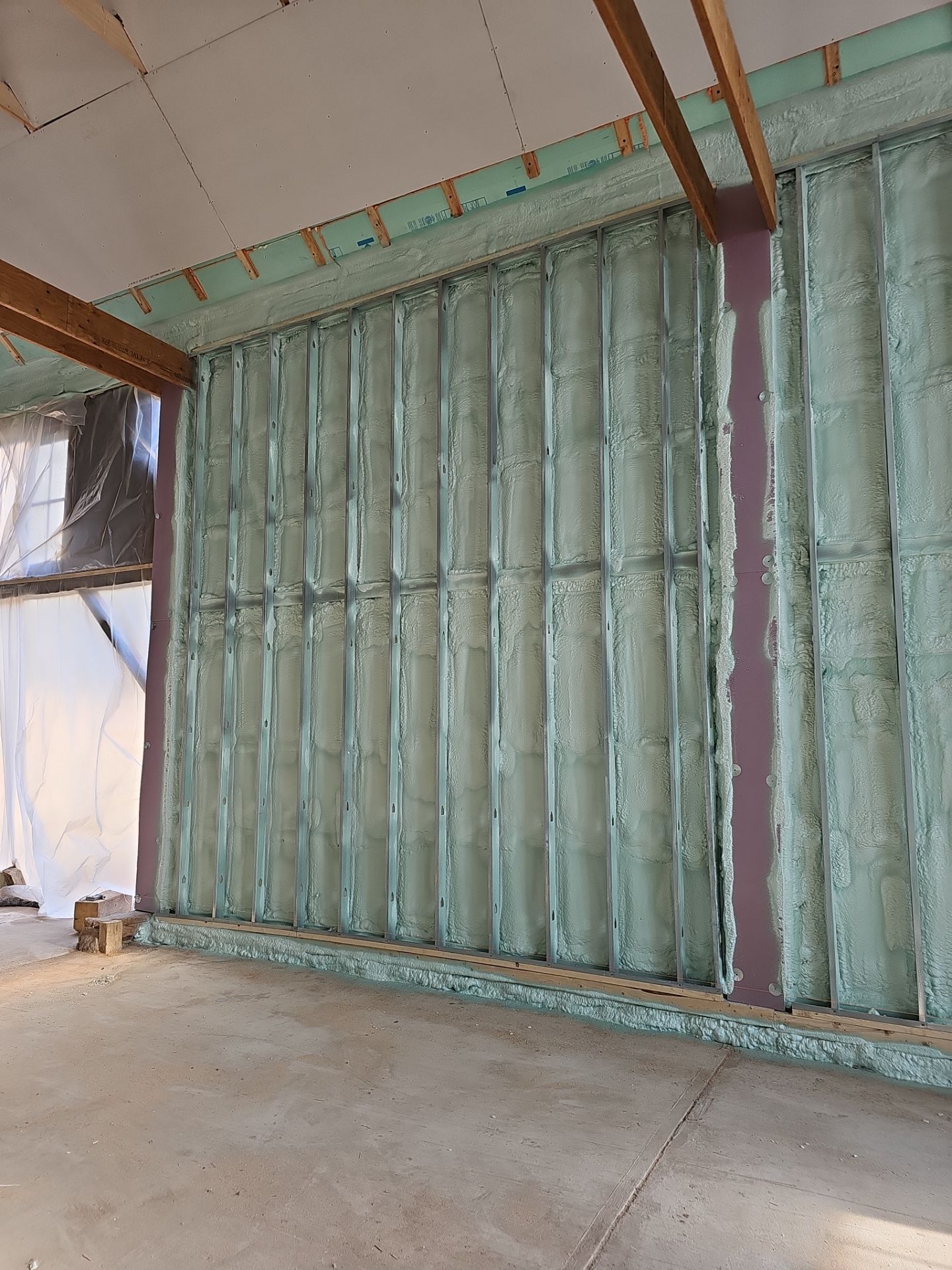 Exterior Installation using Closed Cell Spray Foam by NYS Foam & Energy