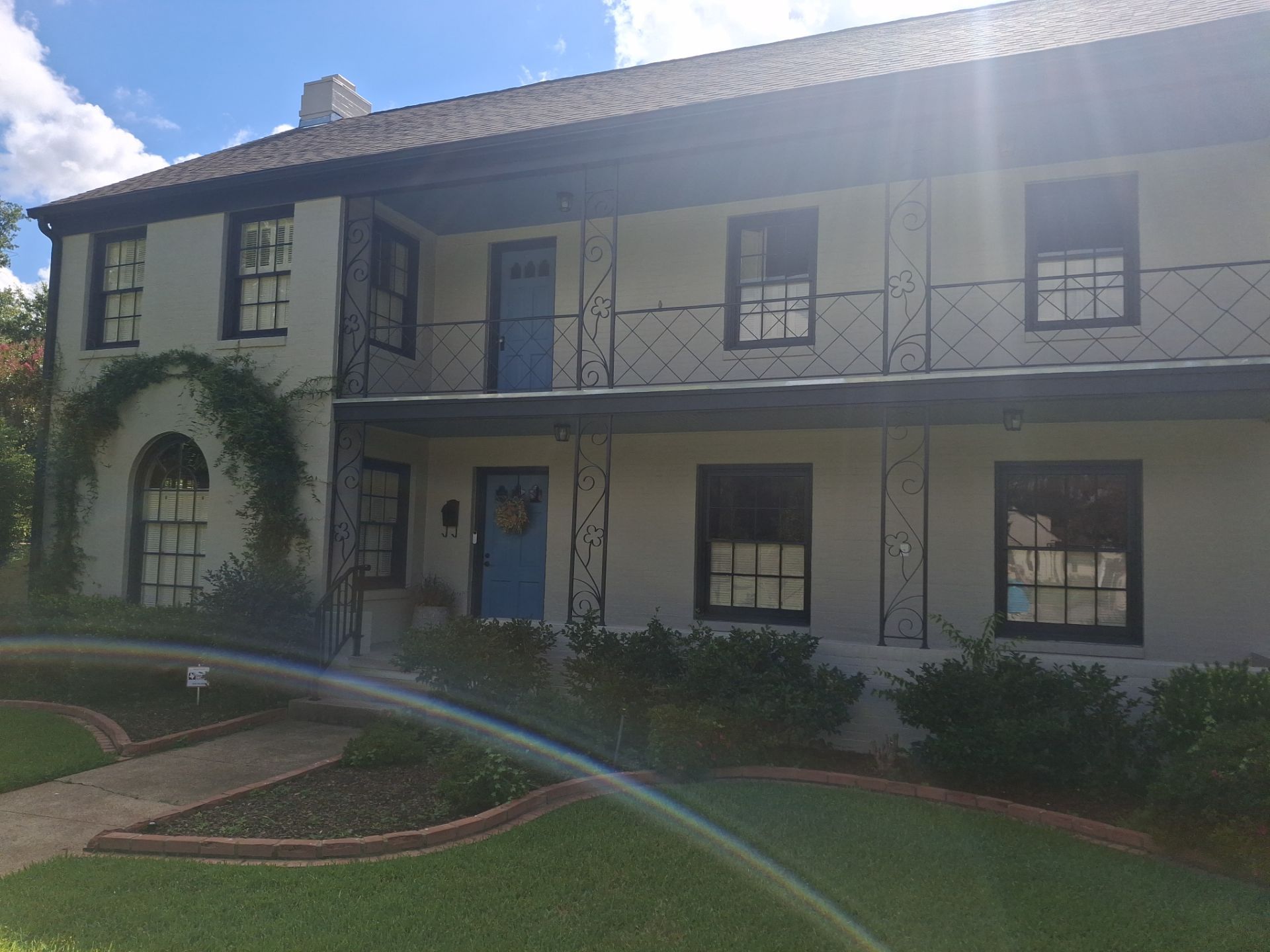 Exterior Painting in Tyler, TX | White Brick Home with Sherwin-Williams Duration by Quality Coats Painting
