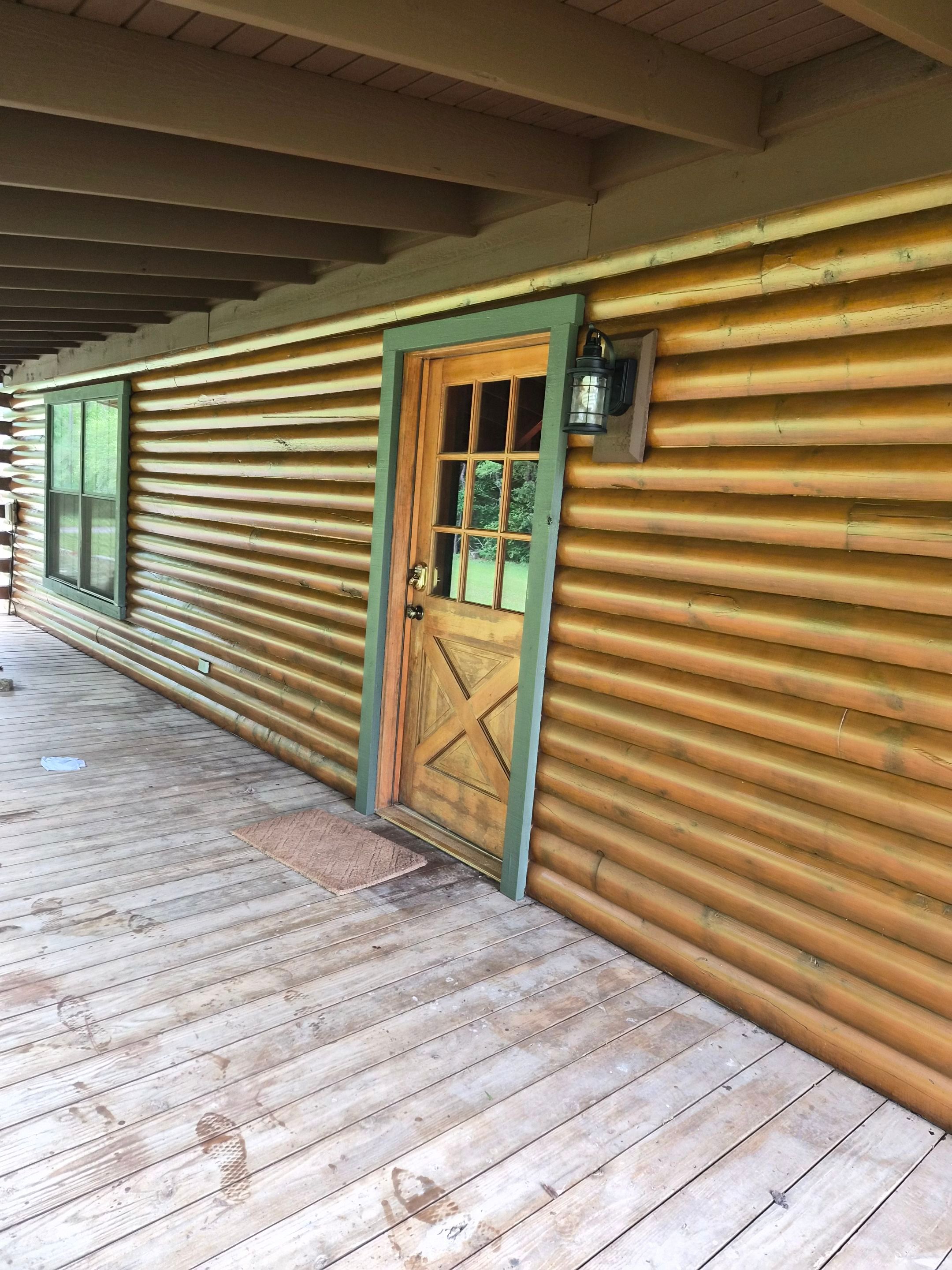A Complete Exterior Refresh for a Custom Log Home & Property in Alba, Texas by Quality Coats Painting