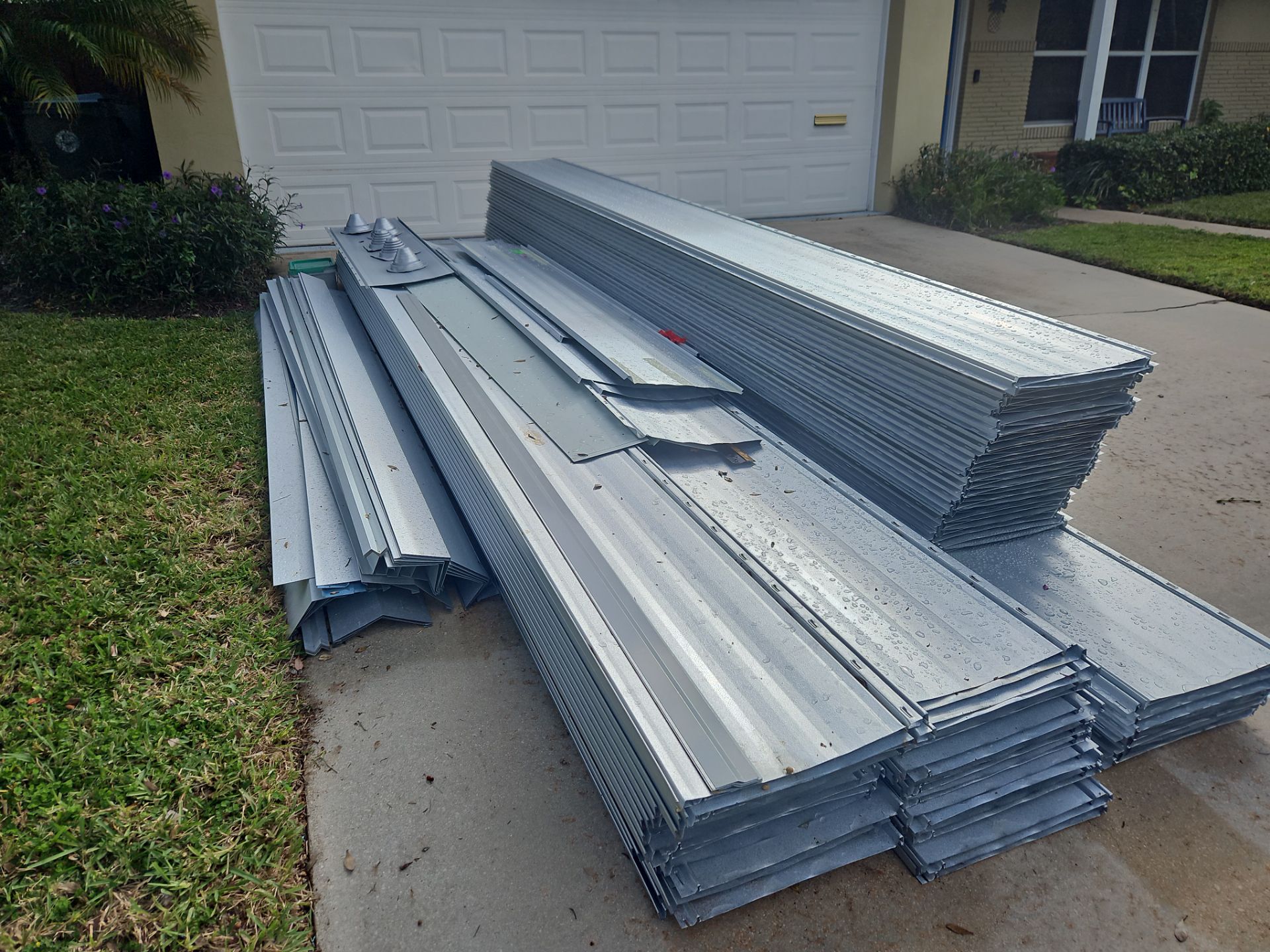 Residential Roofing Installation using 1" Nail strip metal roof by BLUES BROTHERS ROOFING