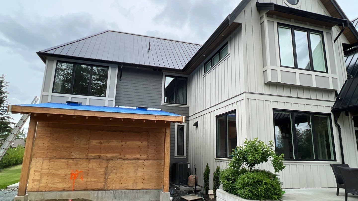 Commercial Roofing Installation using 12" Prolok metal  by Top Notch Roofing Inc