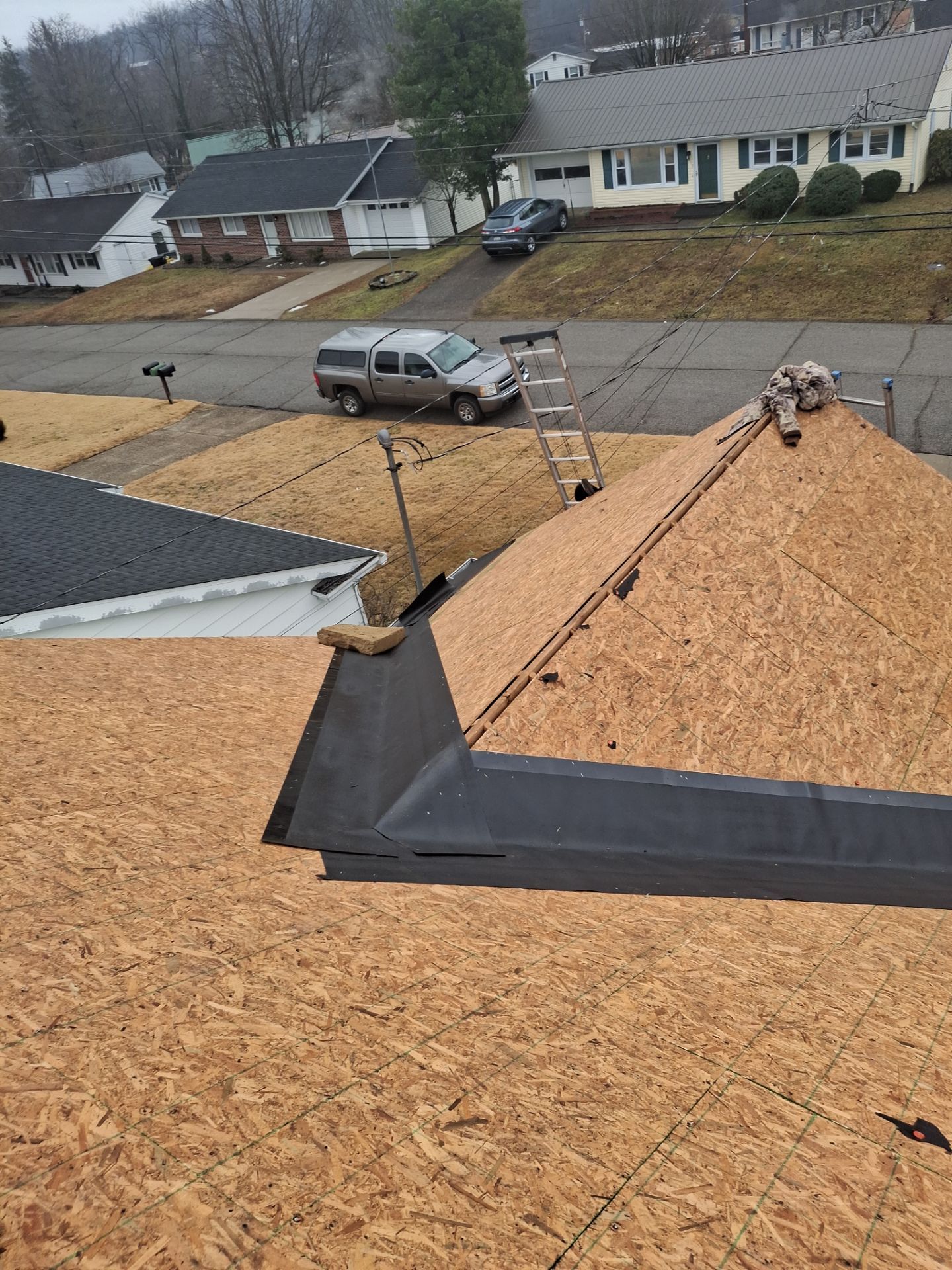 Residential Roofing Installation using GAF Timberline HDZ Charcoal by Rainstoppers Roofing