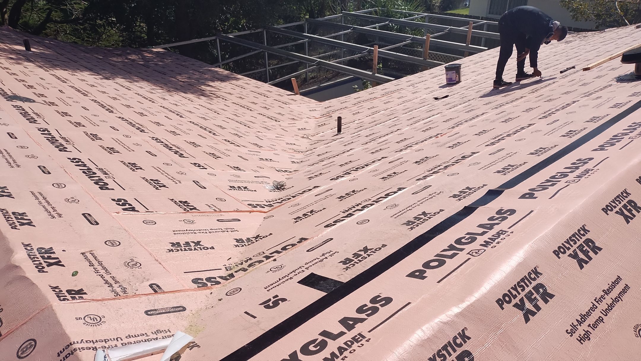 Residential Roofing Installation using 1" Nail strip metal roof by BLUES BROTHERS ROOFING