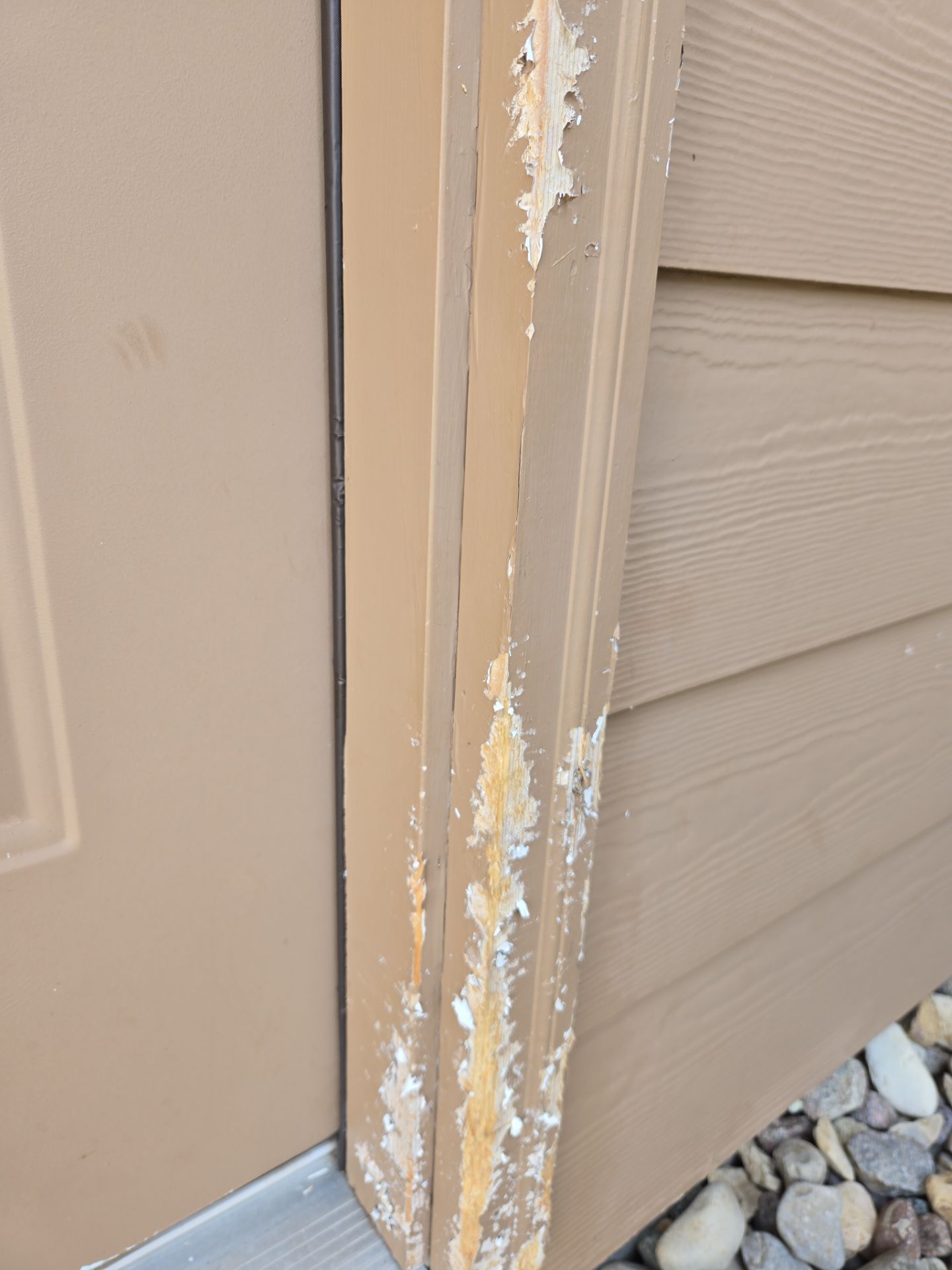 Sioux Falls Residential Exterior Door and Siding Refresh by Select Painting, Coatings & Garage Cabinets