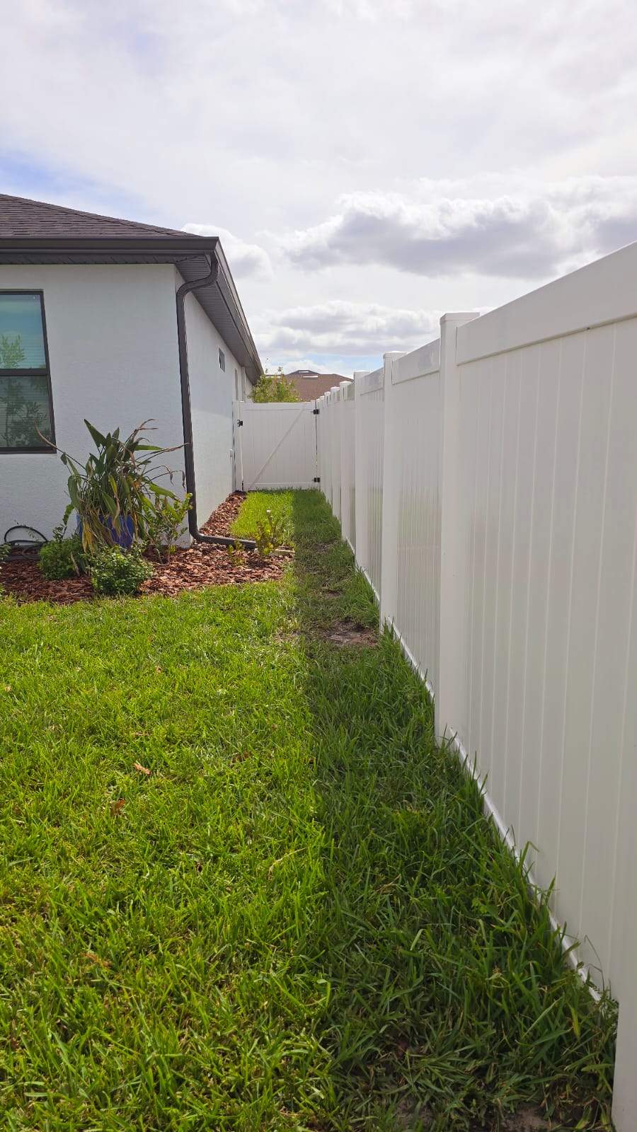White Vinyl Privacy Fence Installation for North Port Residential Property by True Fence LLC