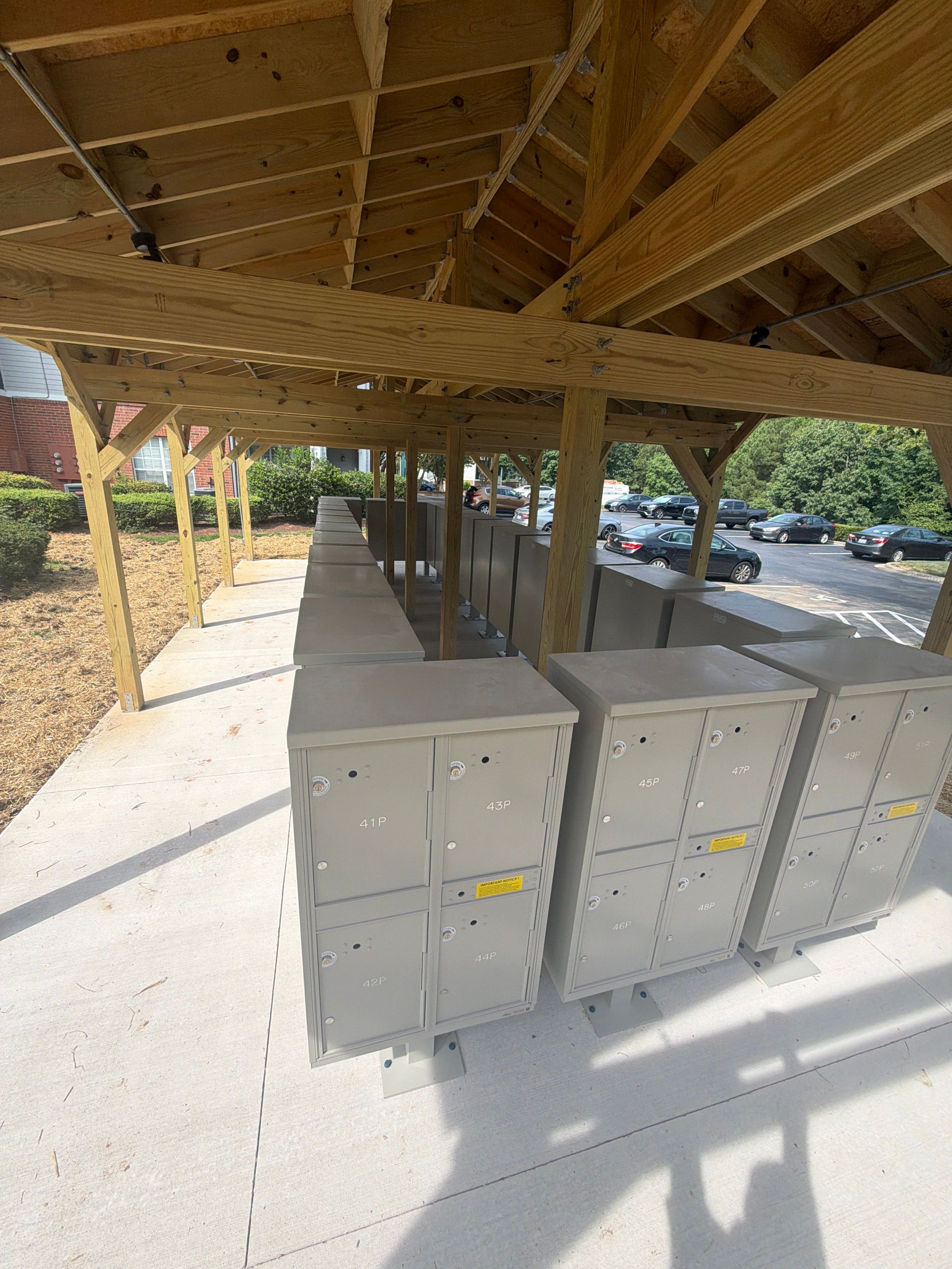 Custom Timber Frame Pavilion for Cluster Mailbox Units in Raleigh by Billy Weatherspoon Contractor