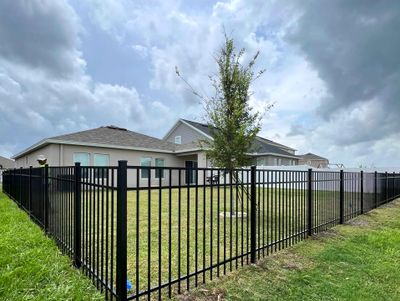 Aluminum Fence Installation using Black 3 Rail Aluminum Fence