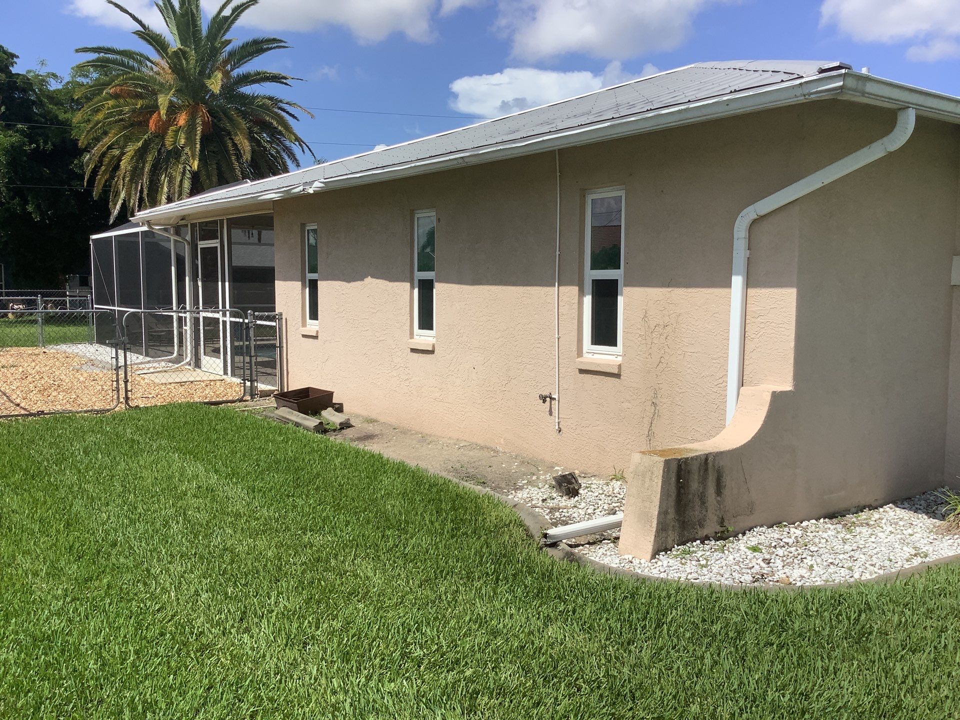 Seamless Gutters for Buildings in Cape Coral FL by Gutter Professors