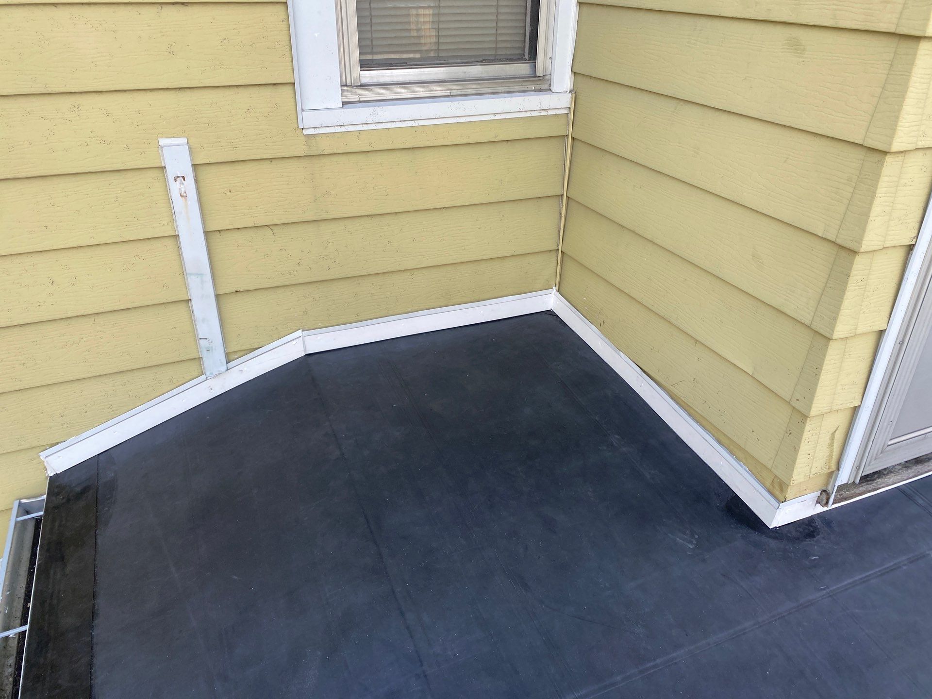 Flat Roof Porch with 60mil EPDM Rubber by Gellings Roofing & Siding