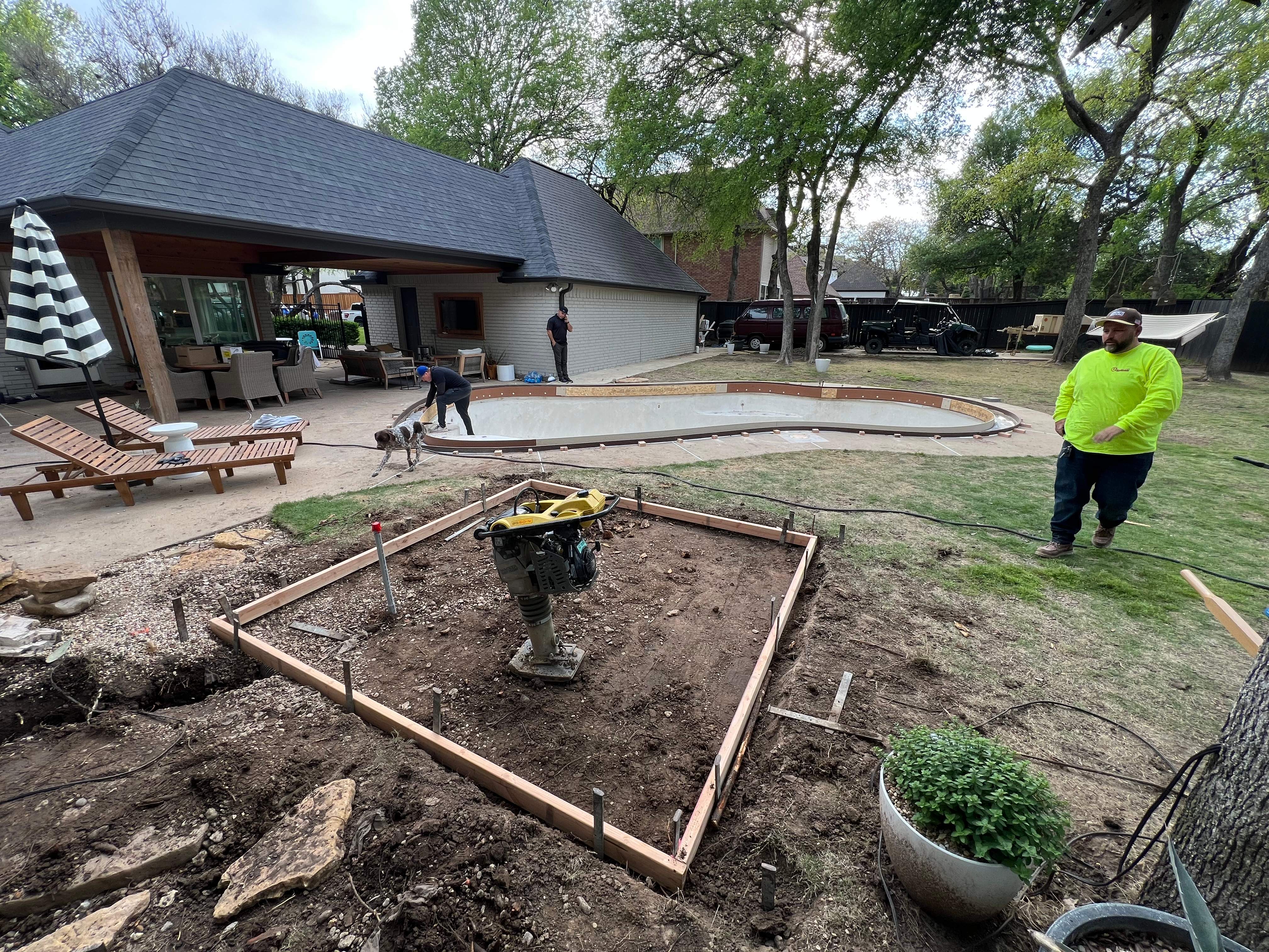 Freeform Pool with Raised Spa and Natural Stone Deck by Pinnacle Pools and Spas - DFW