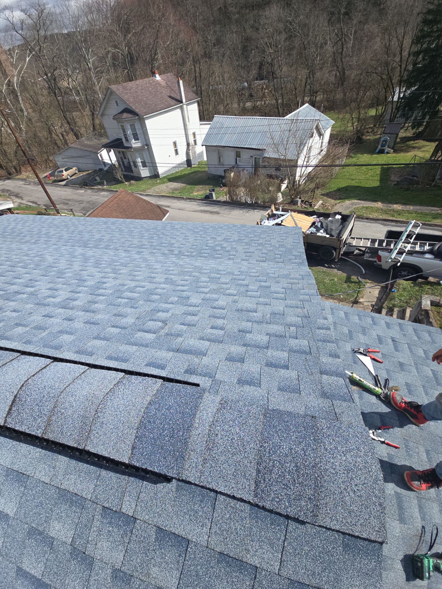 Residential Roofing Installation using GAF Timberline HDZ Biscayne Blue by Rainstoppers Roofing
