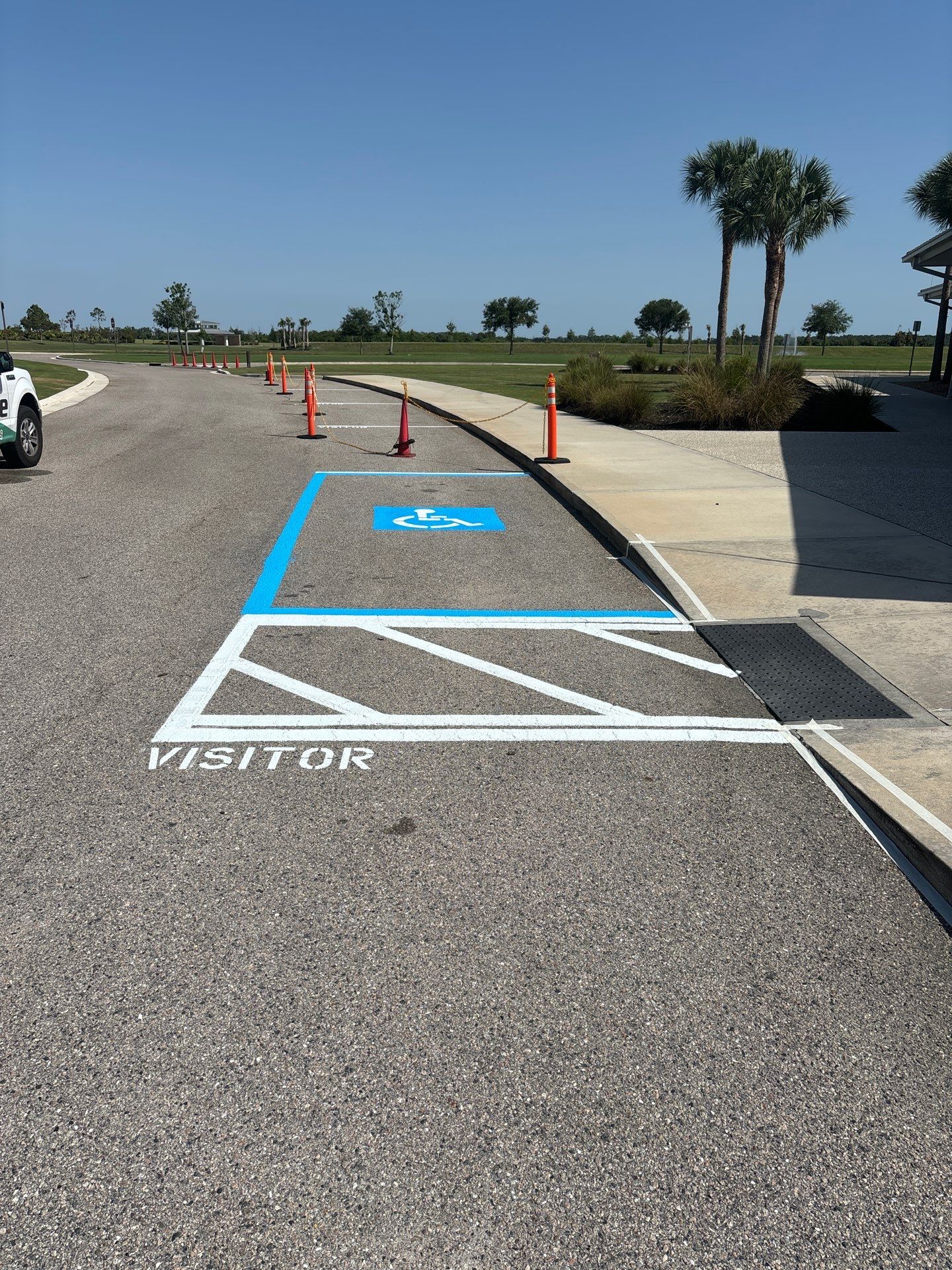 Line striping at Sarasota National Cemetery by Everline Coatings & Services - Southwest FL