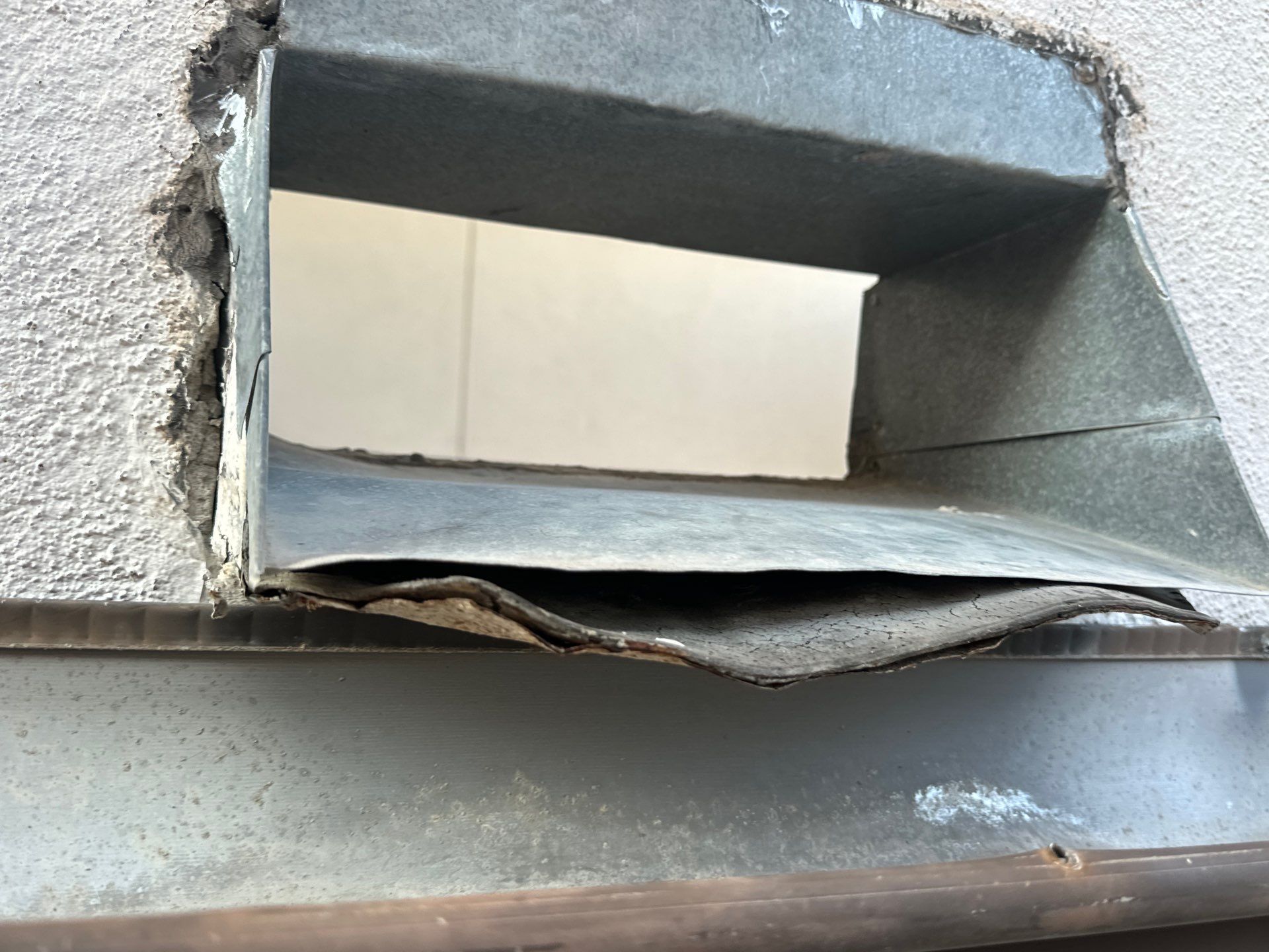 Scupper Repair Wall Leak by Associates Roofing Unlimited