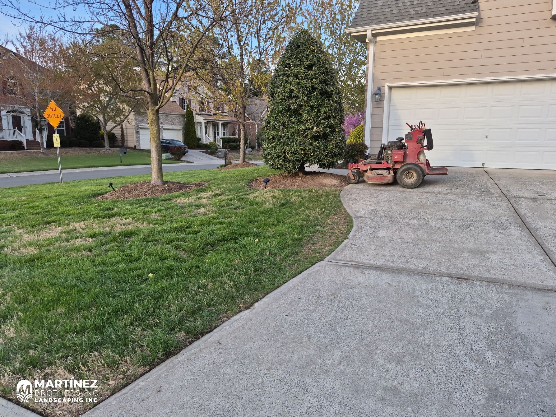 Fixing brown spots in grass in Durham by Martinez Brother’s Nc Landscaping Inc