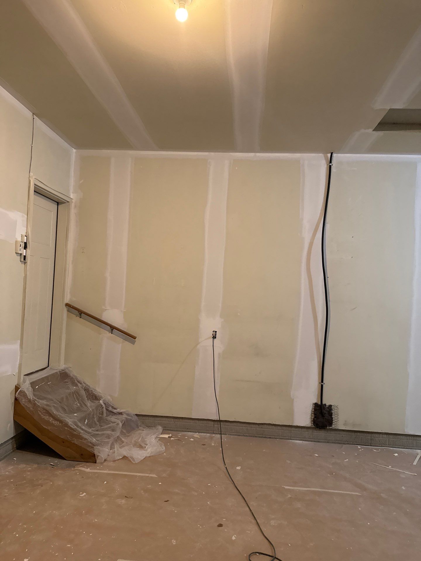 Residential Garage Interior Painting and Drywall Repair in Tea by Select Painting, Coatings & Garage Cabinets