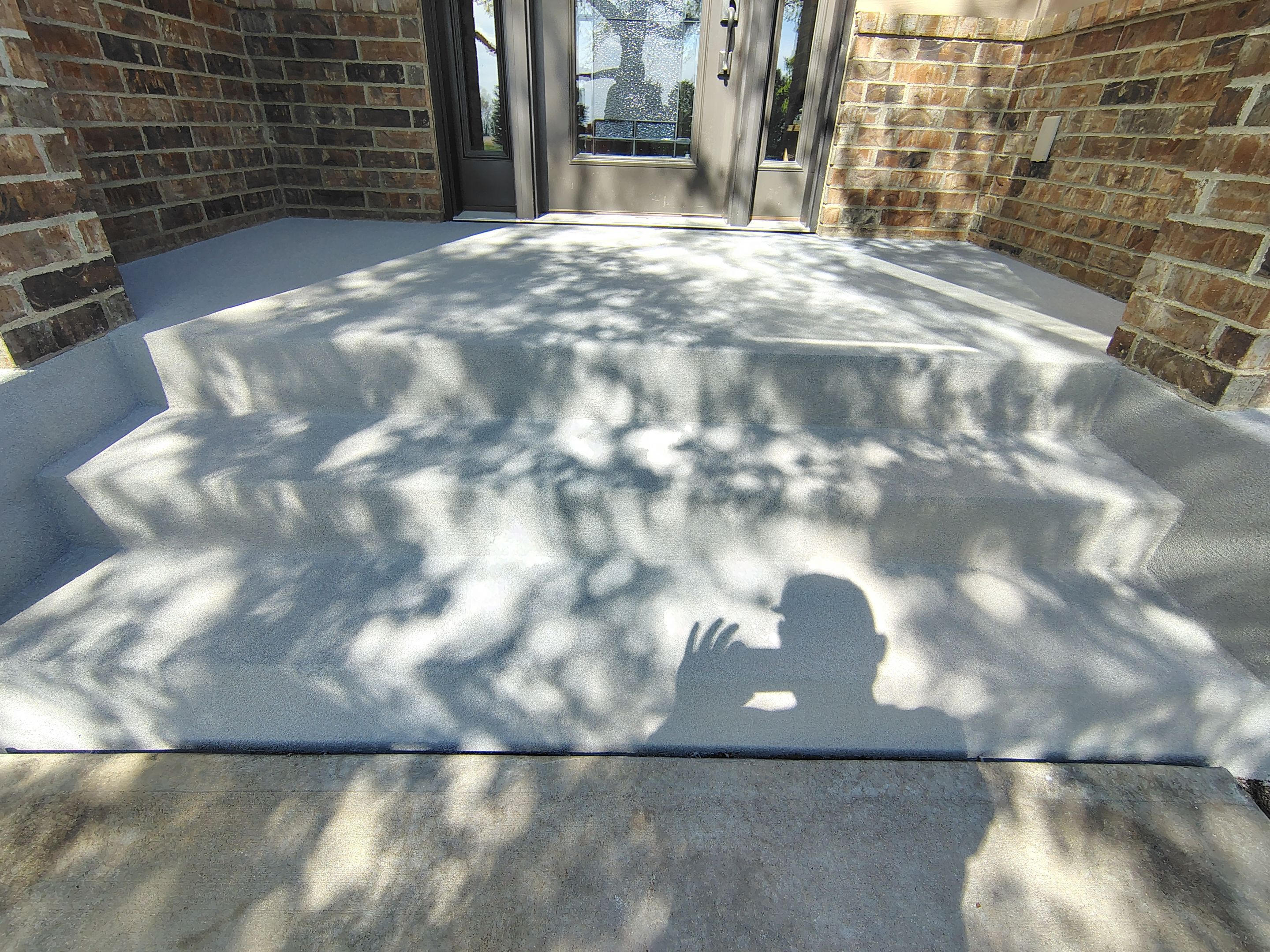 Front Porch Concrete Coating and Restoration in Harrisburg by Select Painting, Coatings & Garage Cabinets
