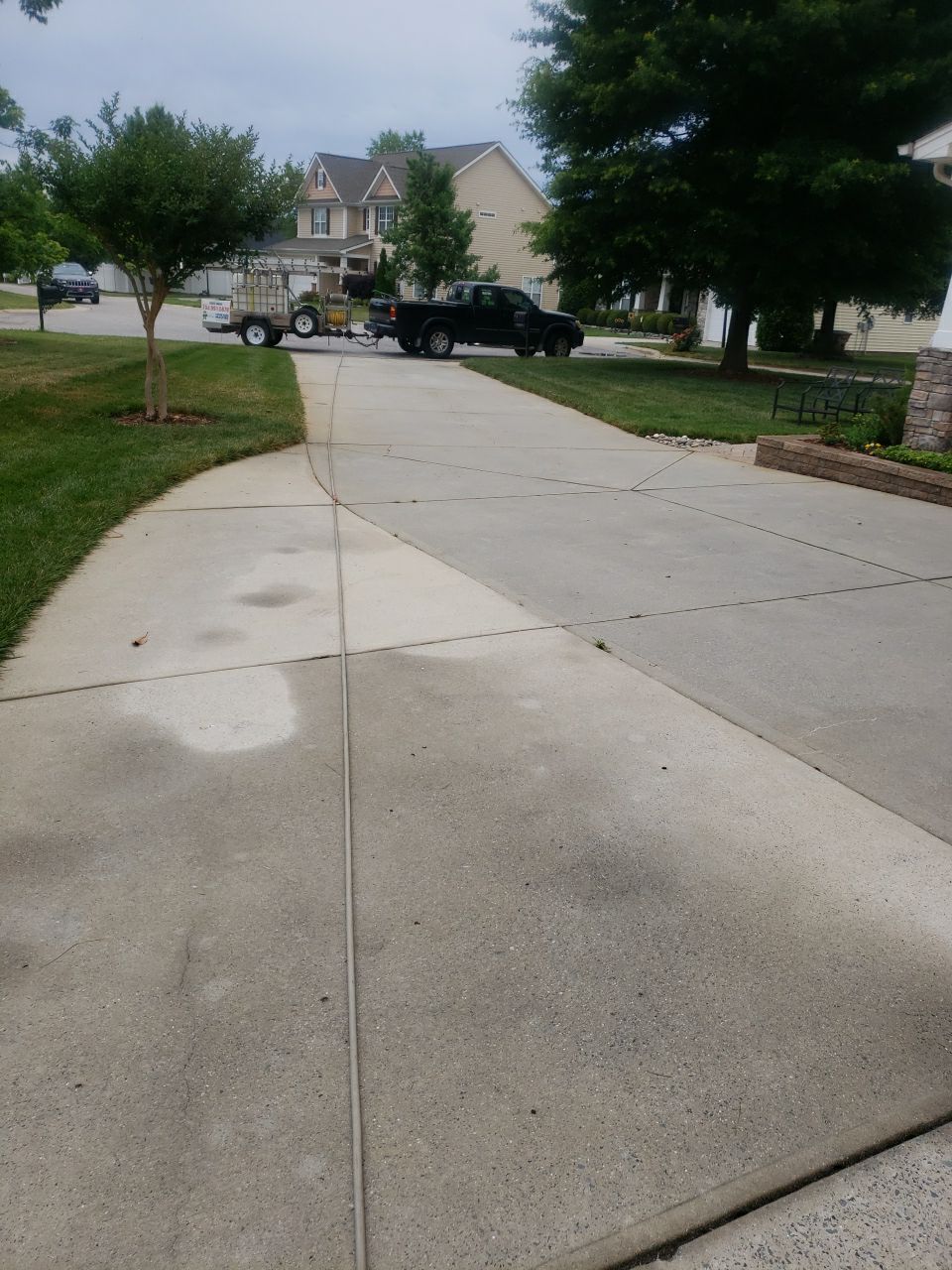 House Wash using cleaner by Power Wash Masters LLC