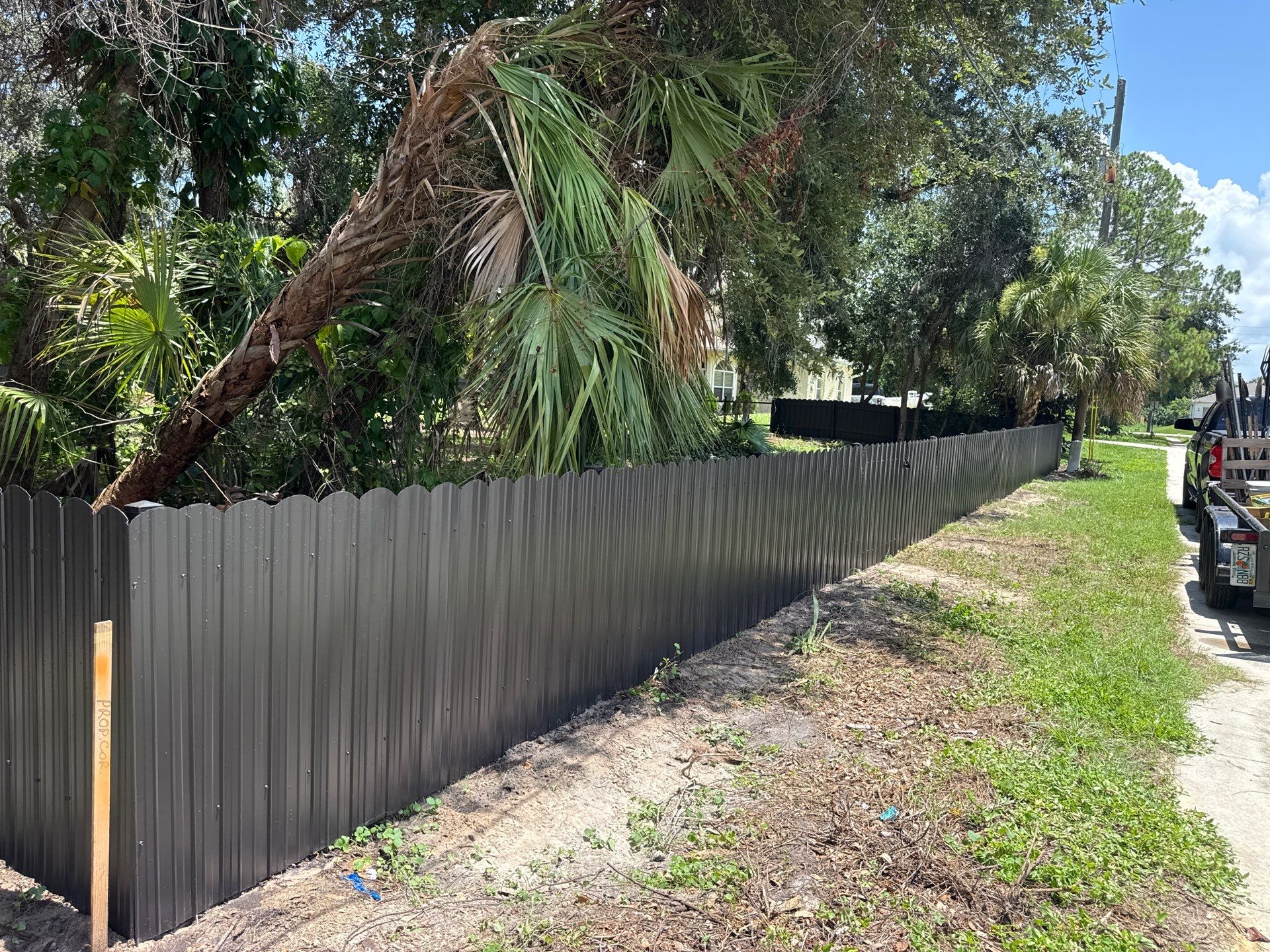 Bronze Scalloped Metal Privacy Fence Installation in North Port by True Fence LLC