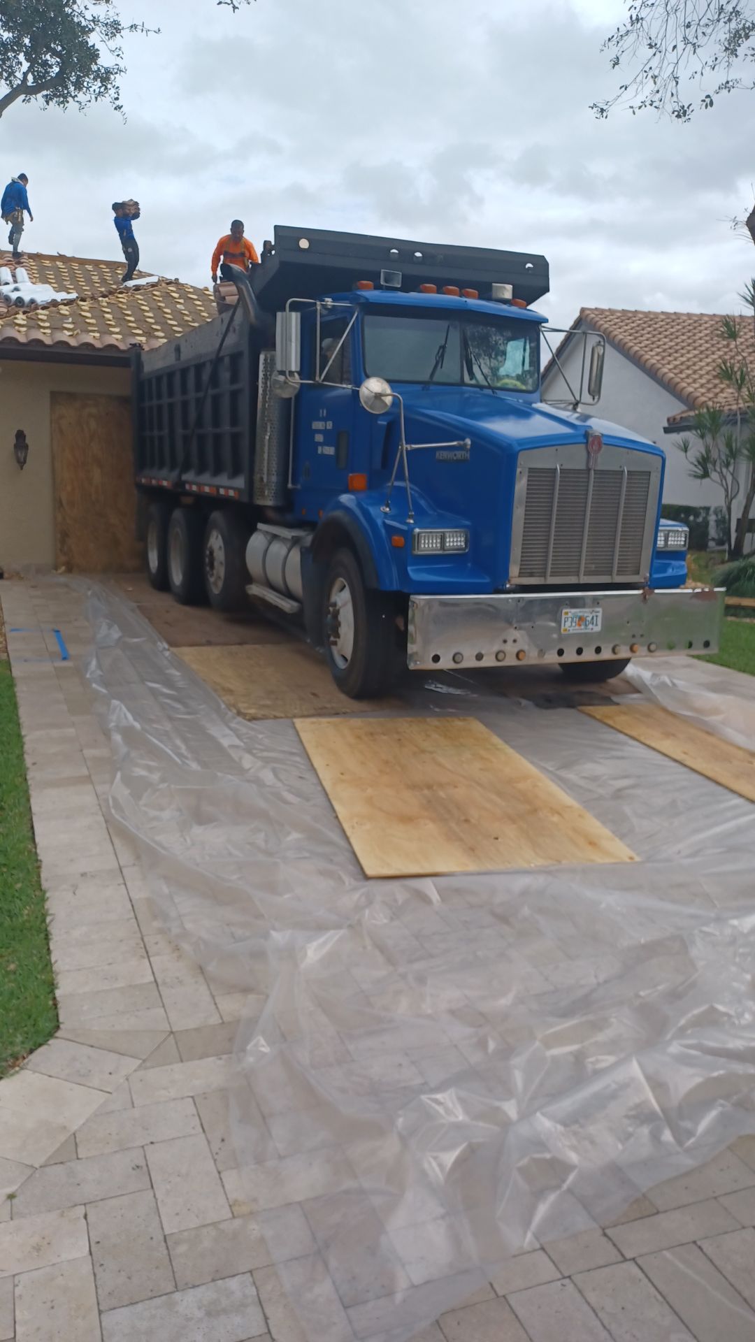 Residential Roofing Installation using 1" Nail strip metal roof by BLUES BROTHERS ROOFING