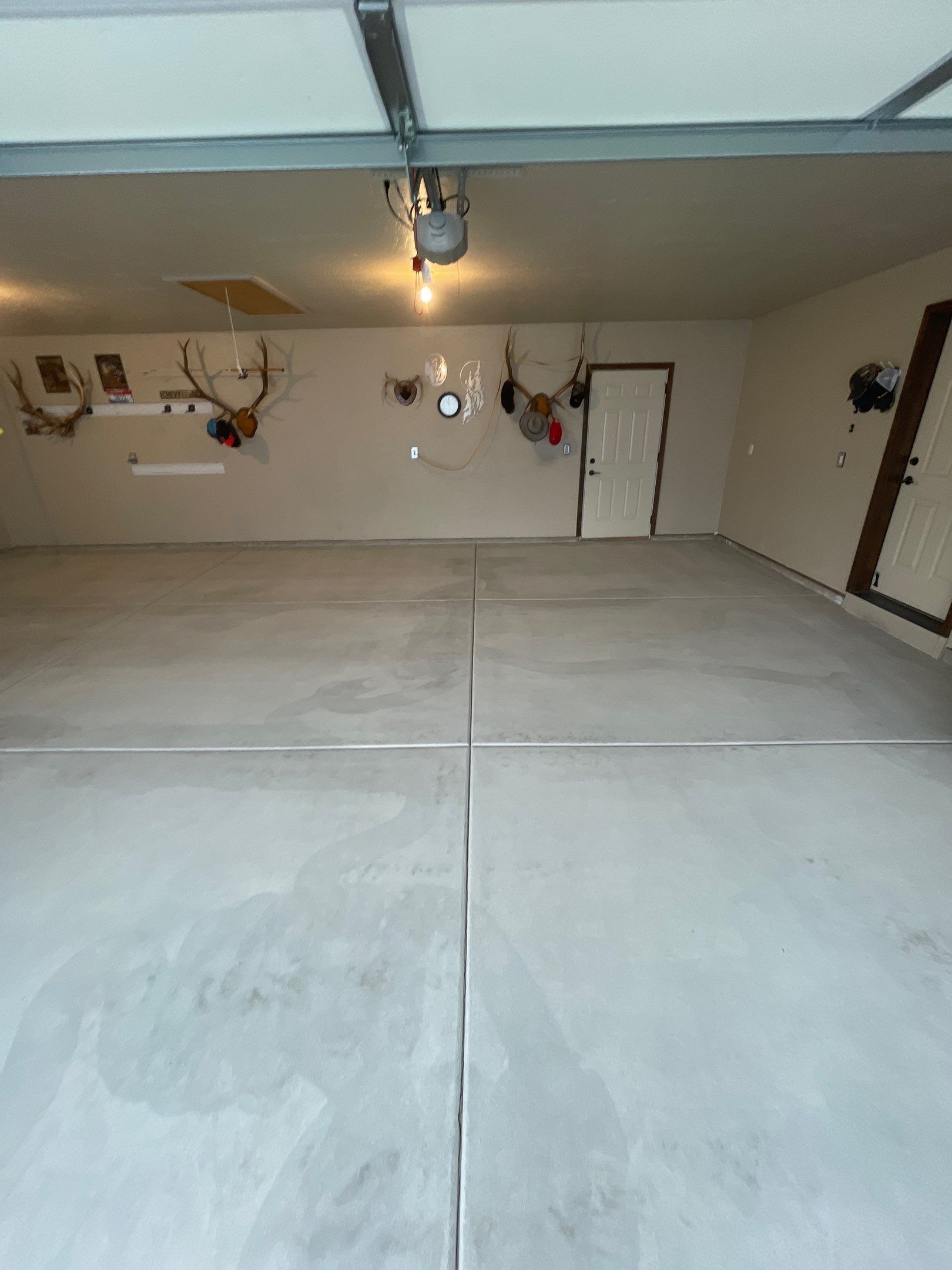 Garage Transformation using Pebble Beach and Front Porch using Greystone by Croc Coatings, LLC