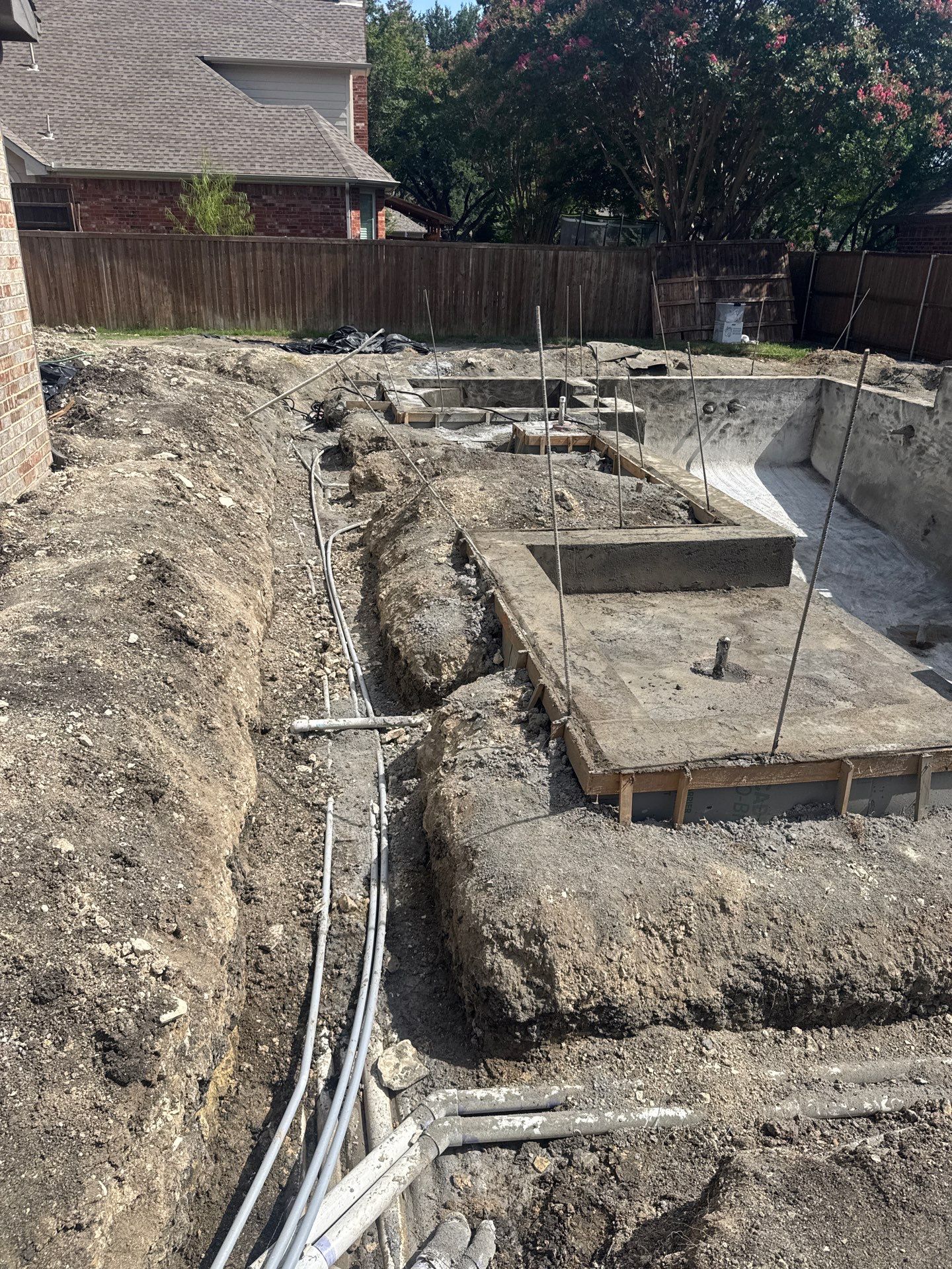 Geometric Pool with Tanning Ledge by Pinnacle Pools and Spas - DFW