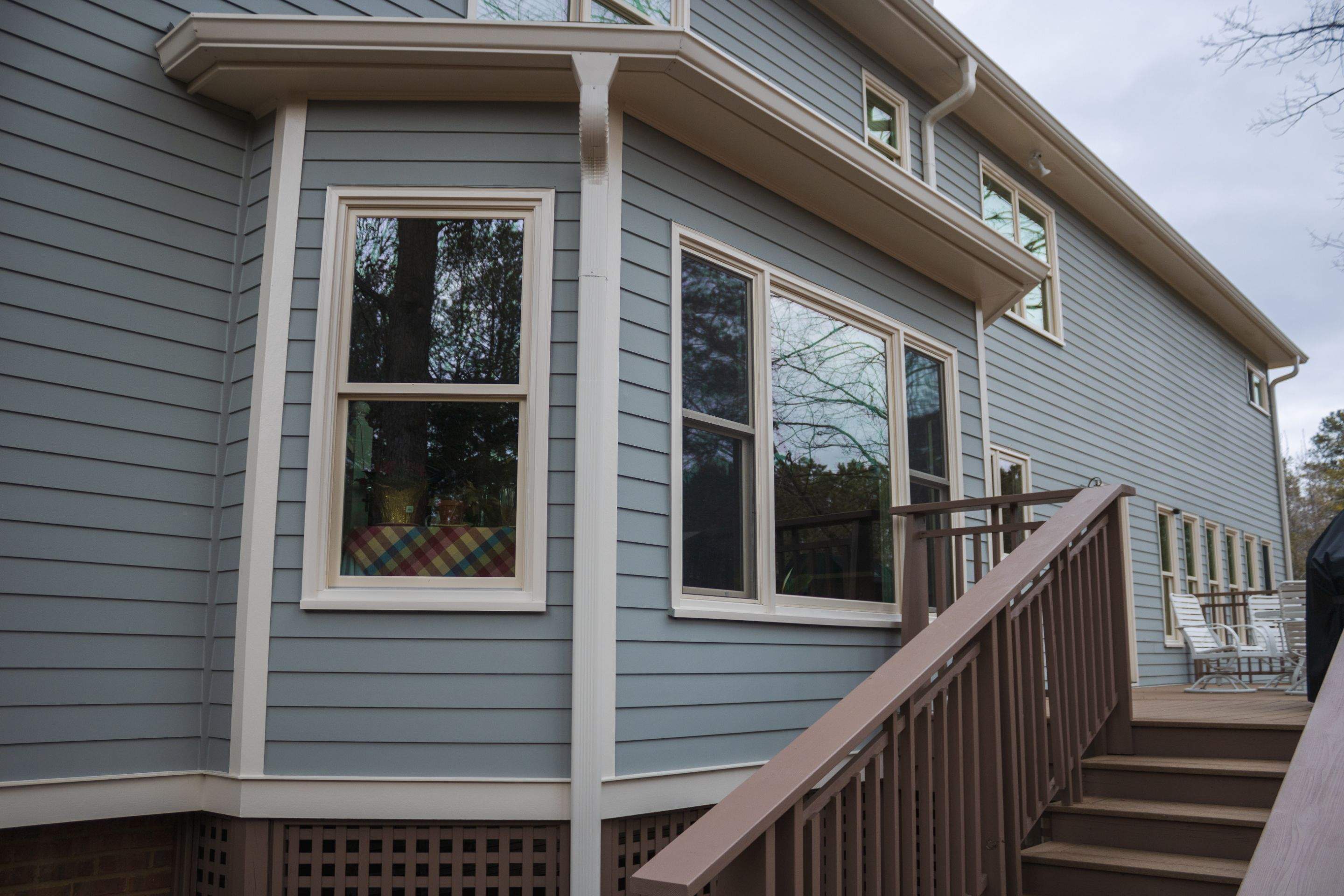 James Hardie Siding Replacement, Exterior Painting, Deck Stain, and Gutter Installation in Peachtree Corners, GA by Nelson Exteriors