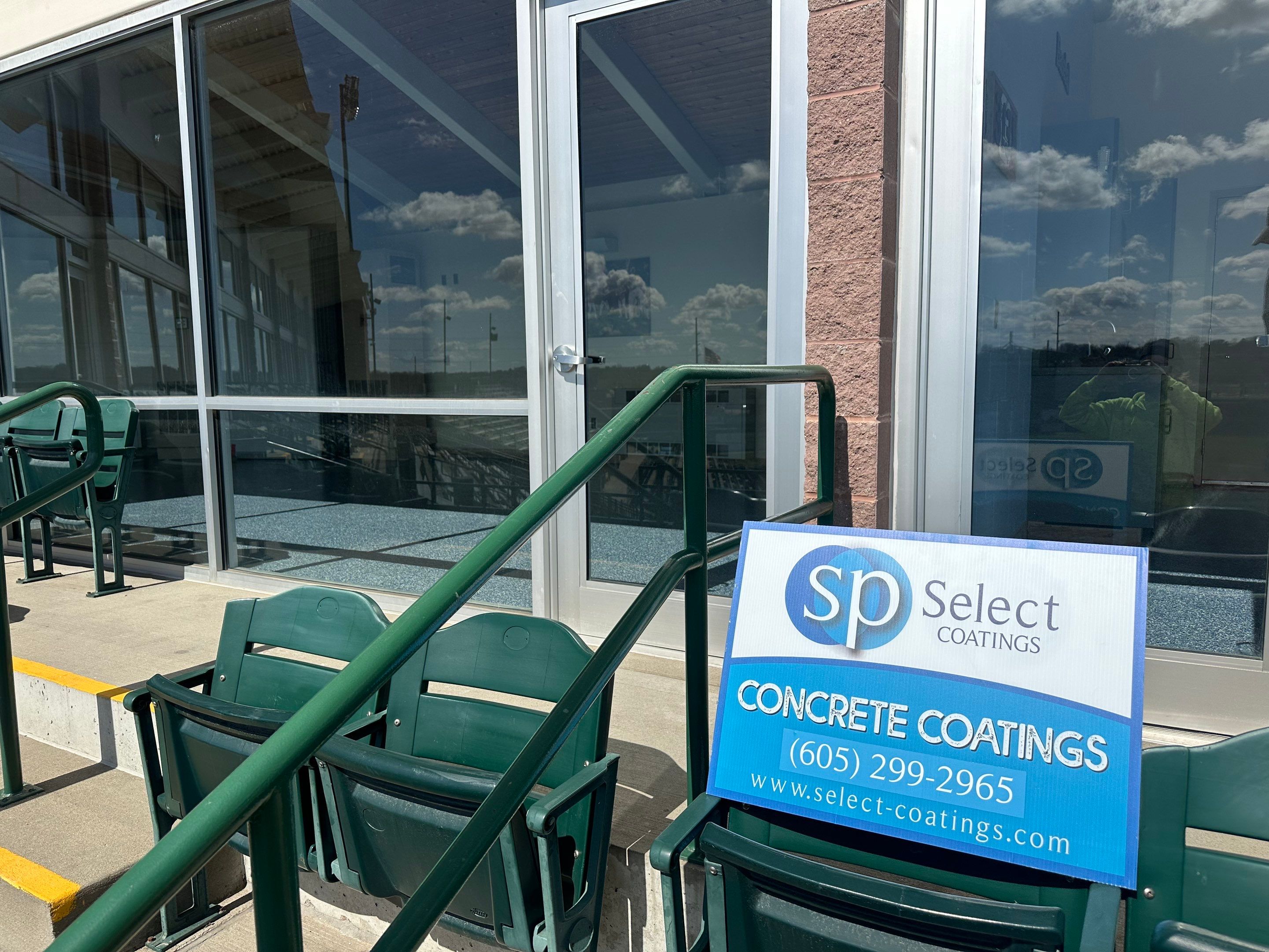 Commercial Epoxy Floor Coating for Stadium Viewing Suites in Sioux Falls by Select Painting, Coatings & Garage Cabinets