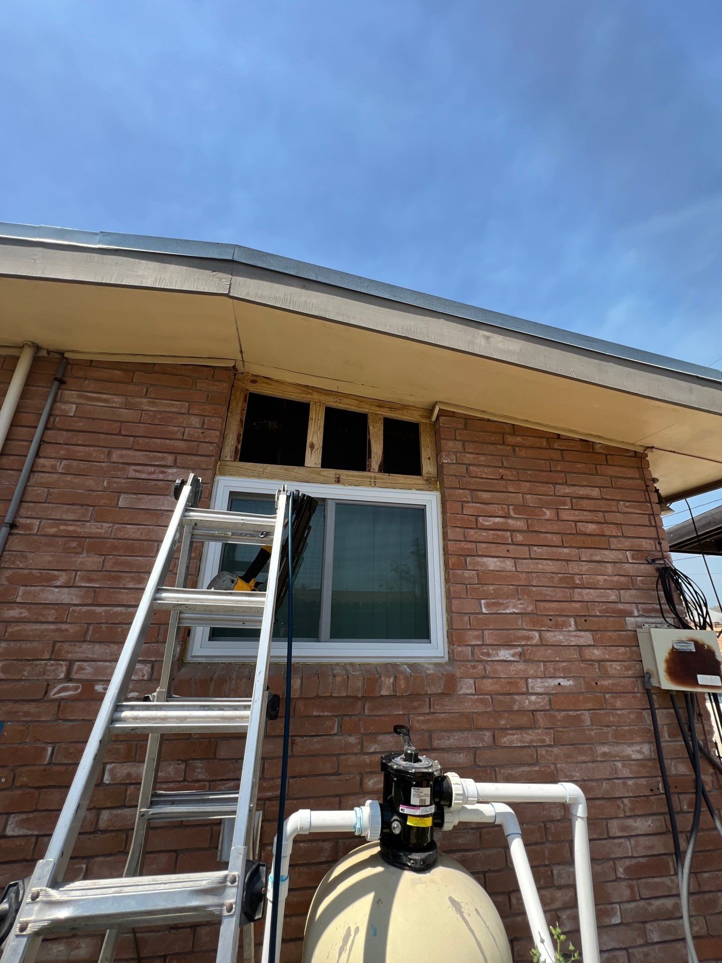 Windows in Brick with a Bay Window by Bayfront Roofing and Construction