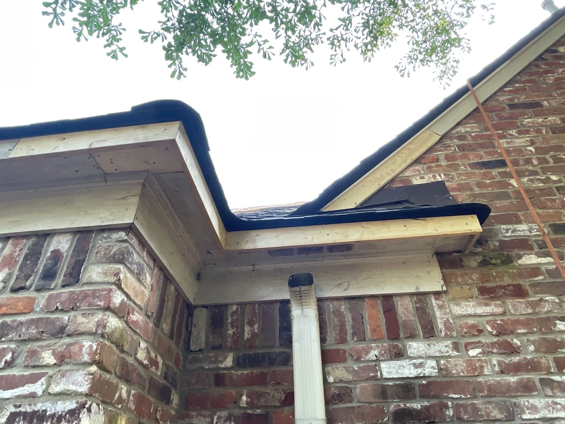 Full Roof Replacement with gutter upgrade after tree impact damage in East Memphis by Revival Roofing Services